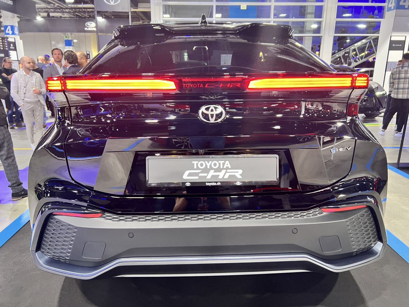 Rear view with integrated LED tail lights and hybrid badge