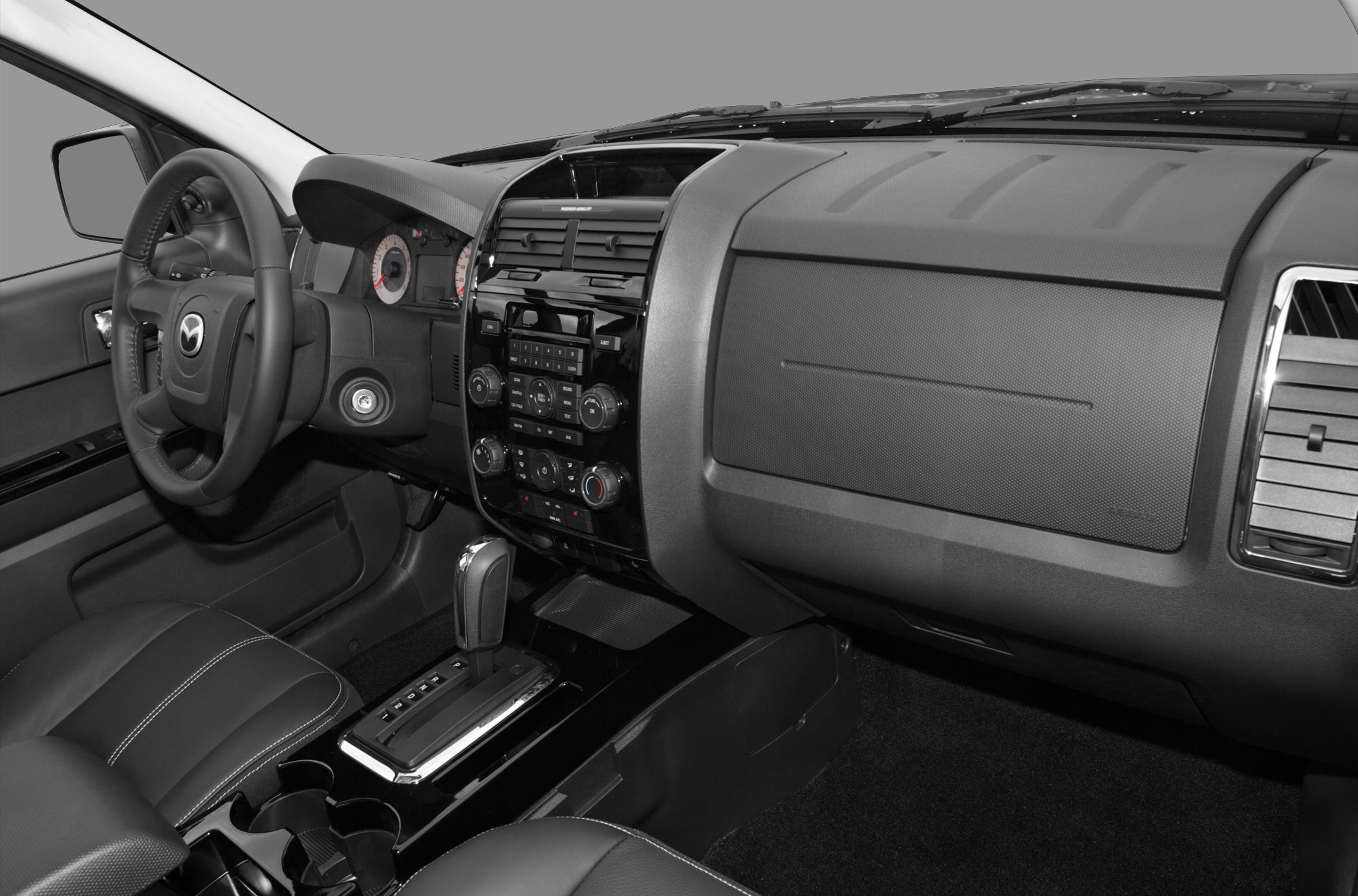 Dashboard, steering wheel, and automatic gear shift interior view