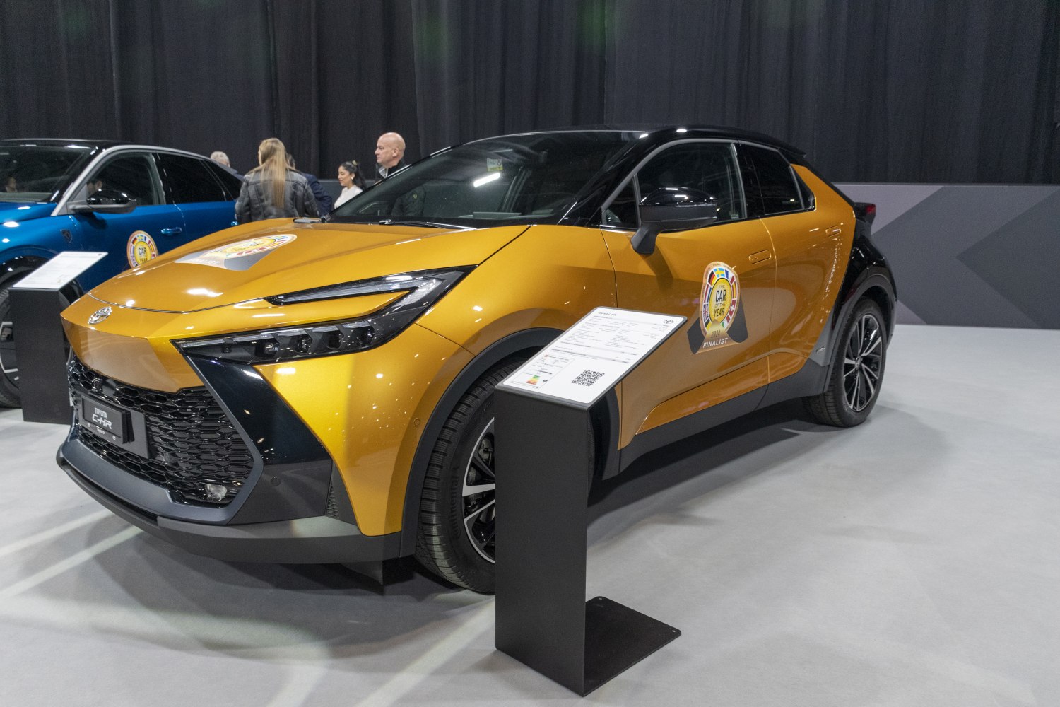 Sharp front fascia with modern LED headlights and two-tone body.