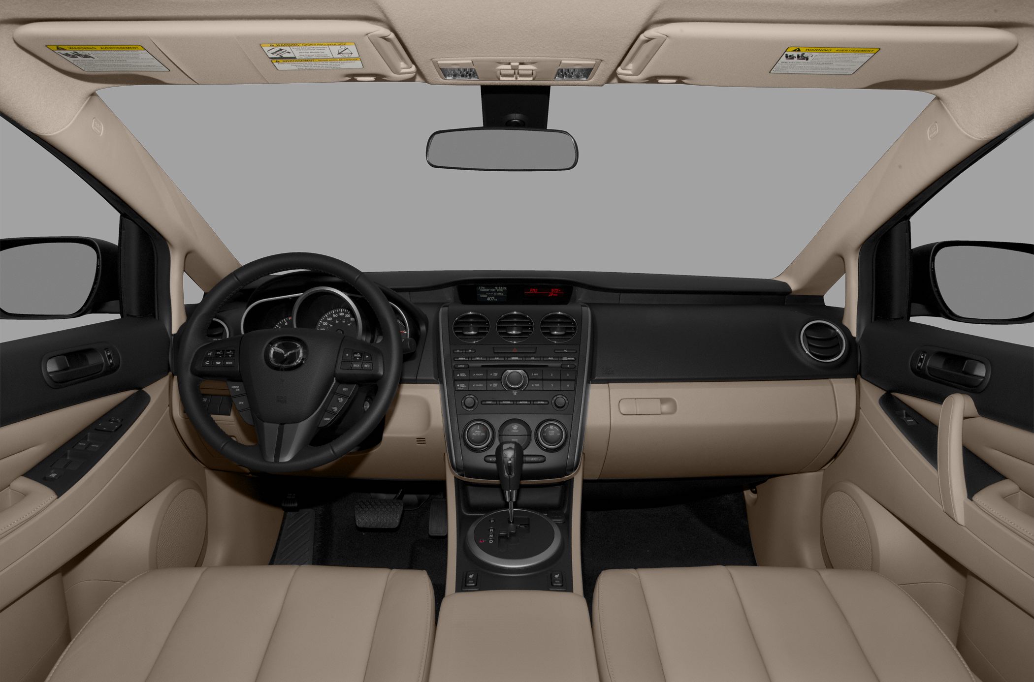 Beige interior with dashboard, steering wheel, and center console.