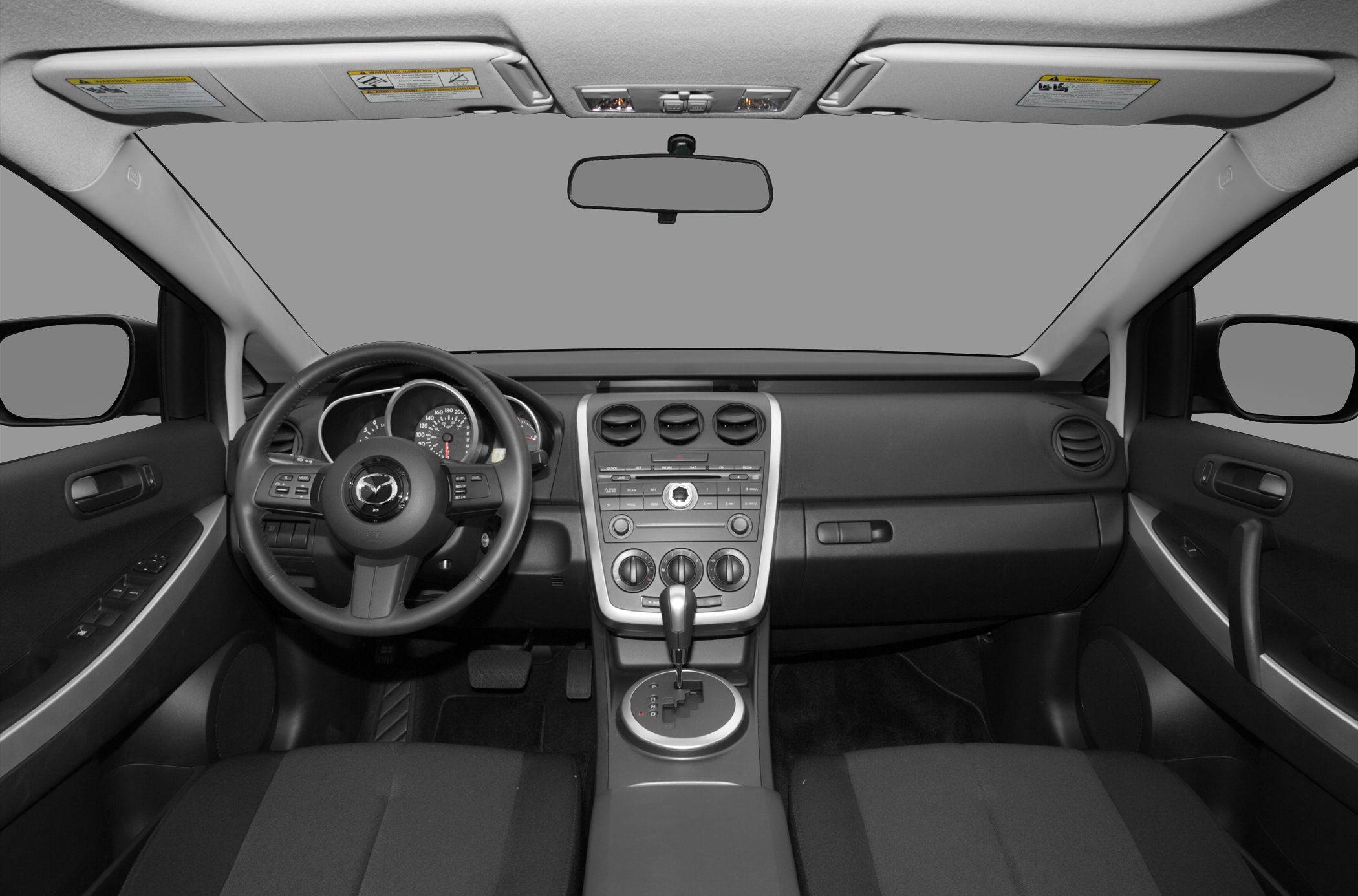 Dashboard, steering wheel, and center console layout with automatic gearshift