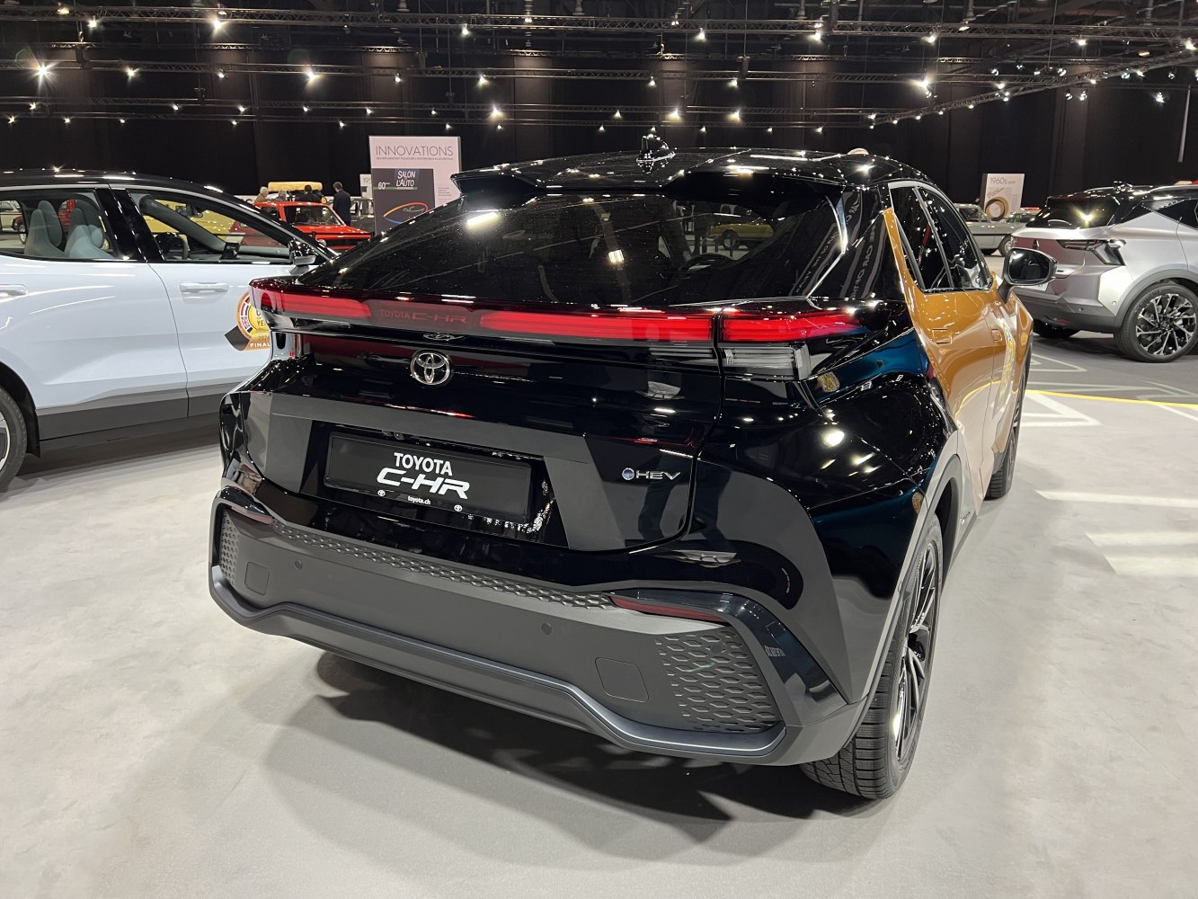 Sleek rear design with hybrid badge and distinctive taillights