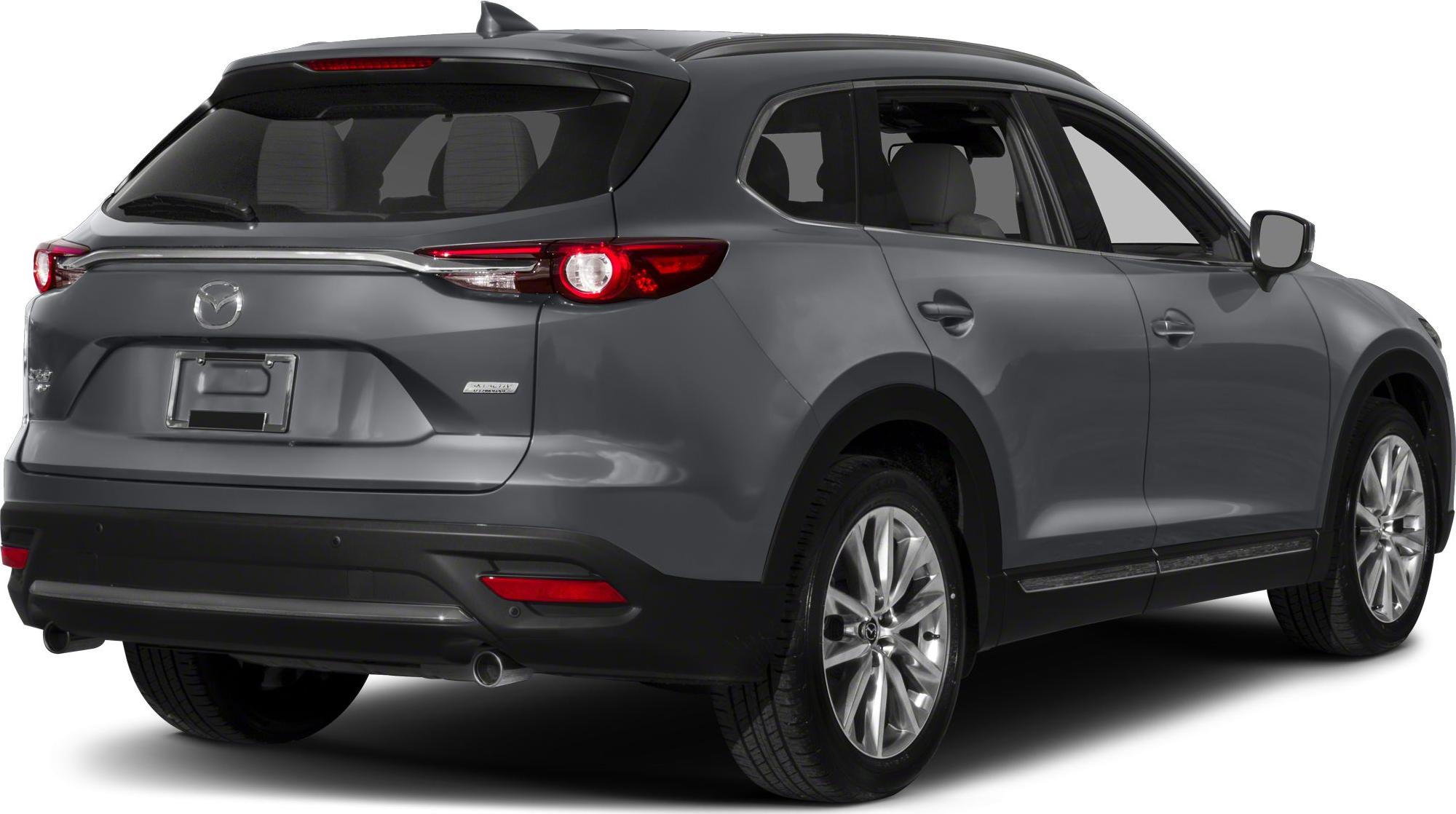 Rear and side view with taillights and dual exhausts of a modern SUV