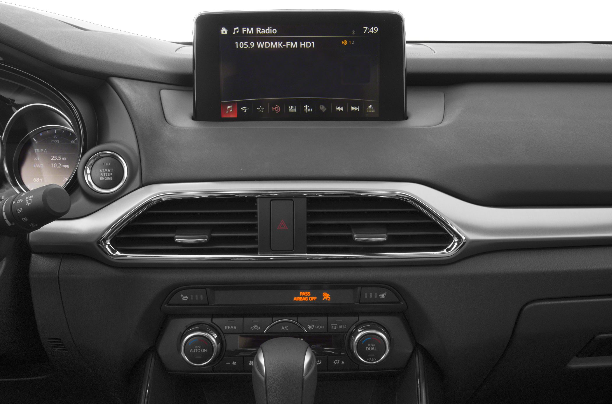 Dashboard with infotainment screen and climate control knobs