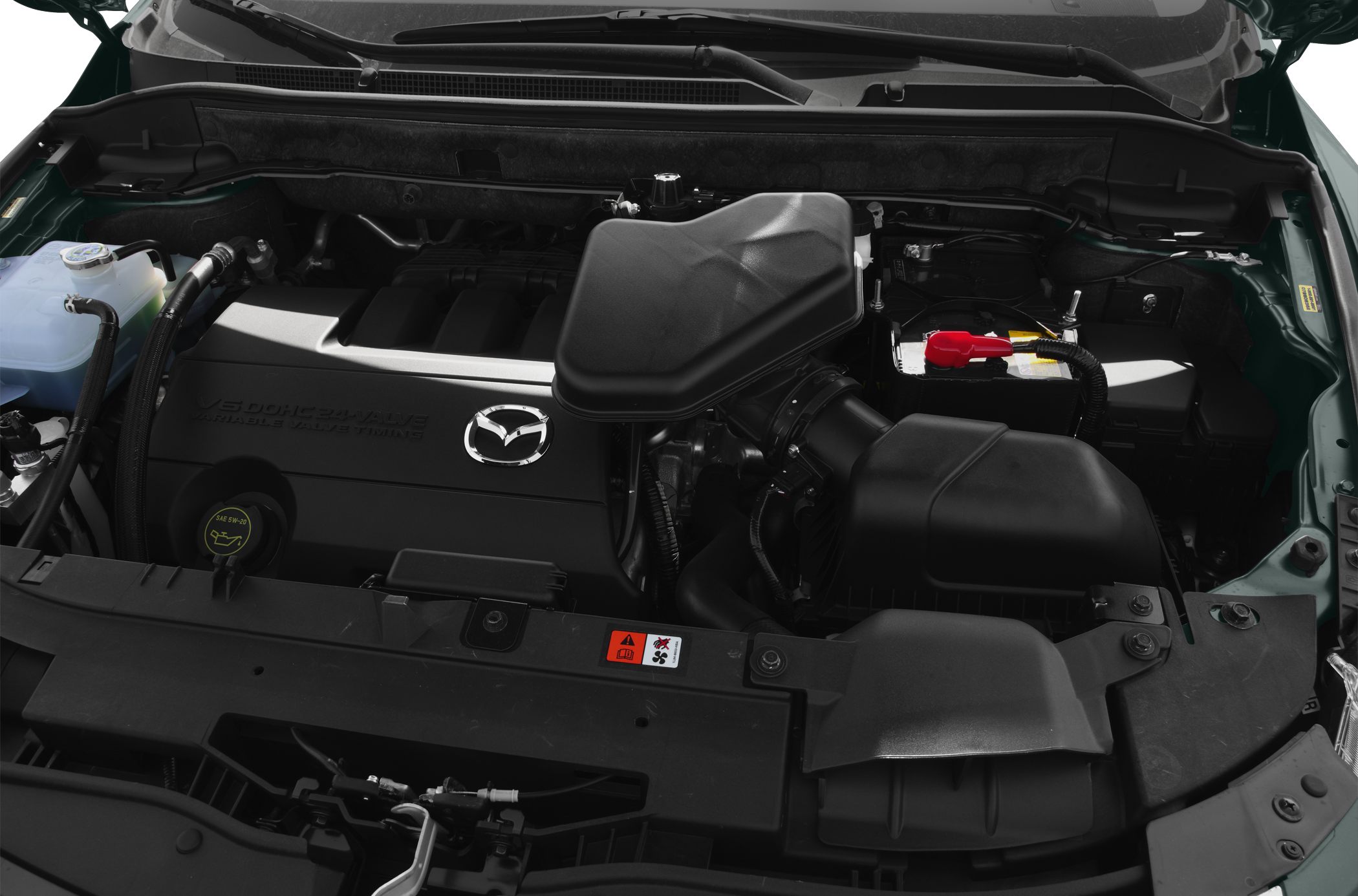 V6 DOHC 24-valve engine bay with intake and battery components