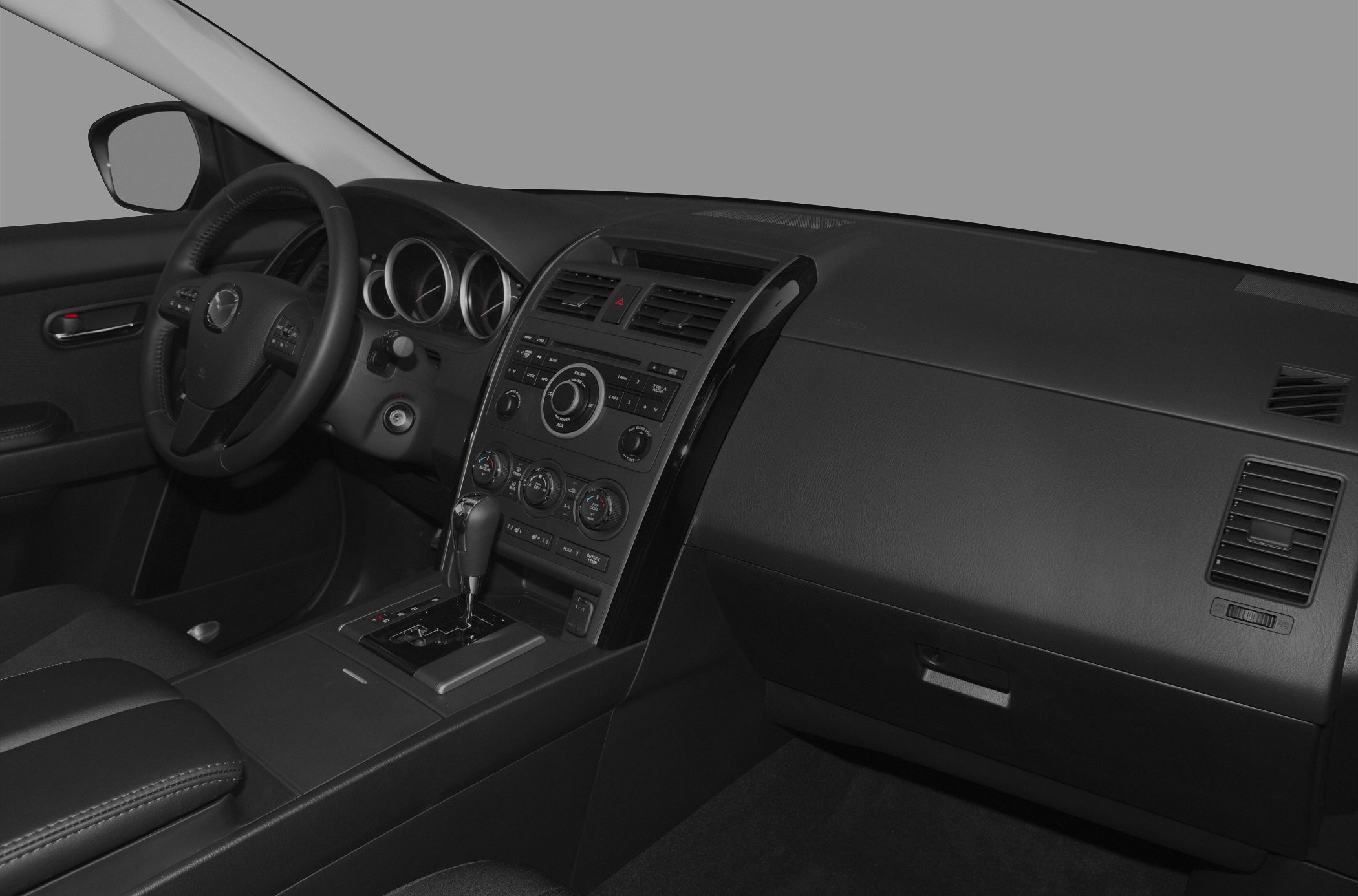Dashboard, center console, and steering wheel with controls