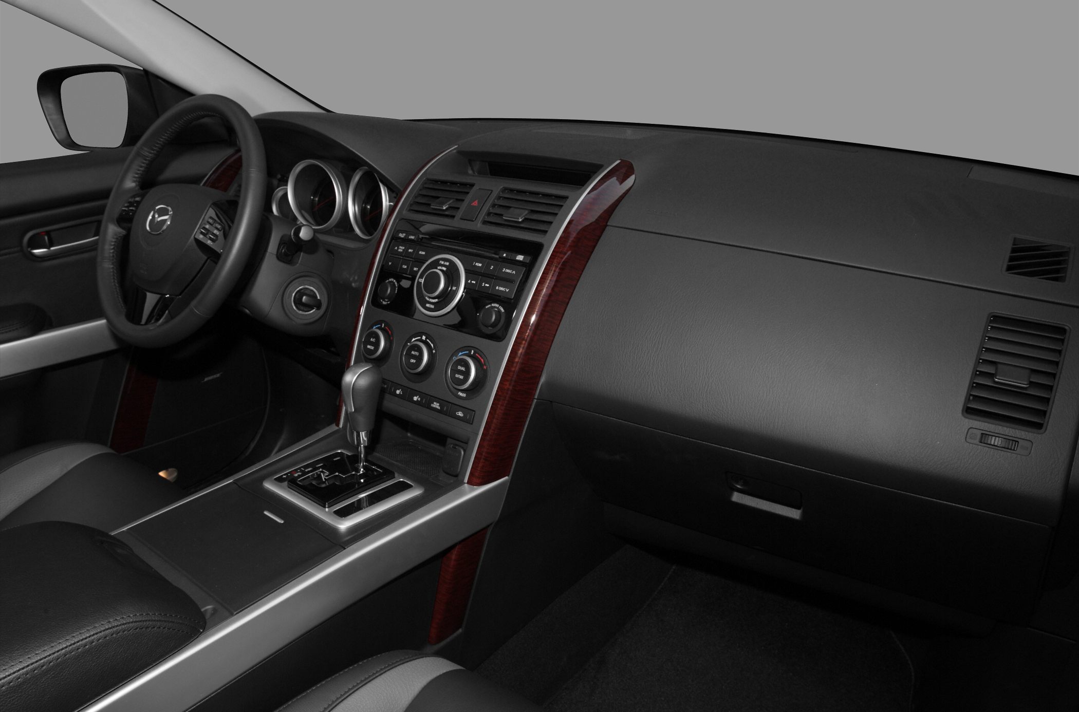 Dashboard and center console with steering wheel and gear shift