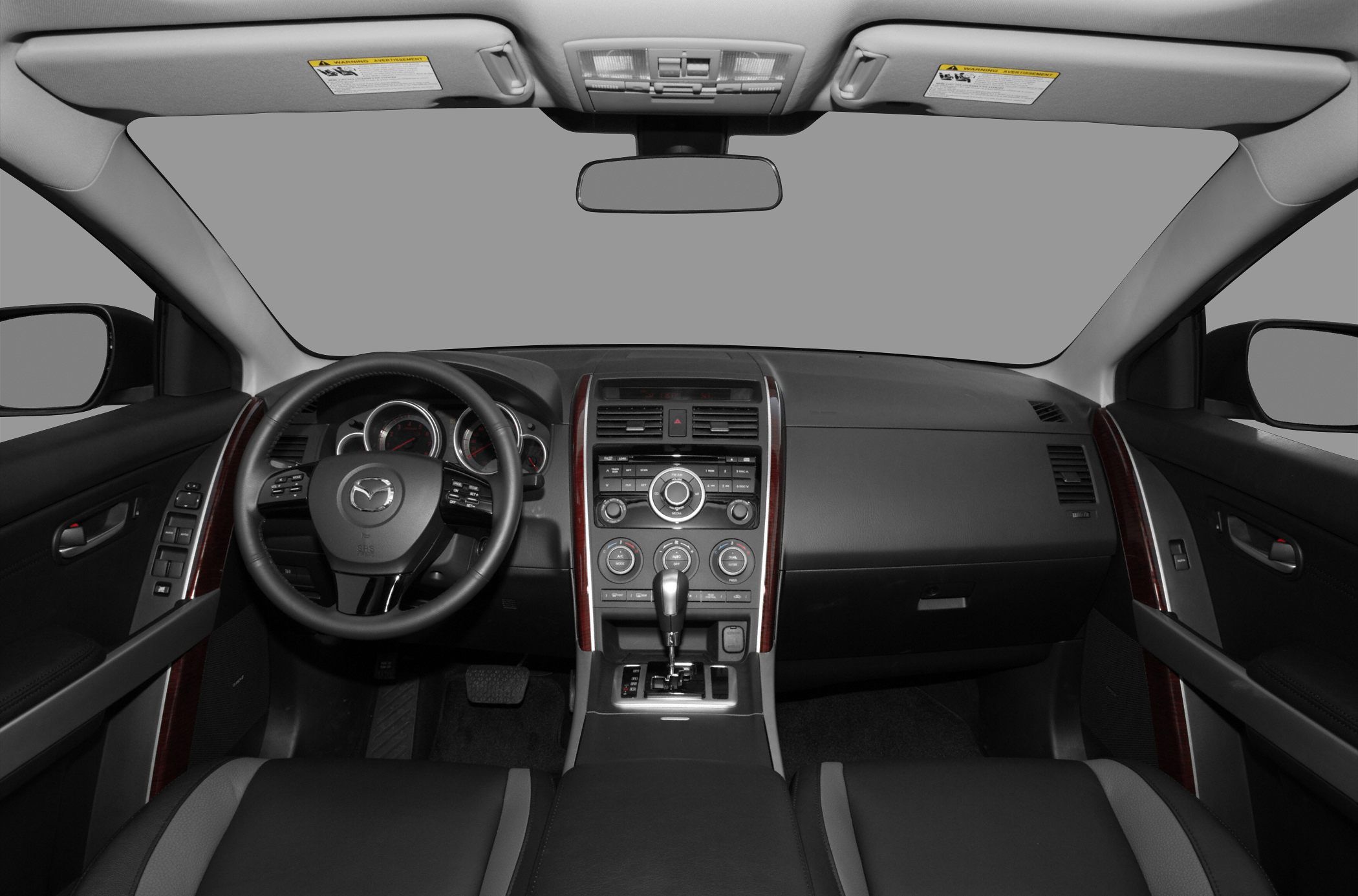 Dashboard, steering wheel, center console view from driver seat.