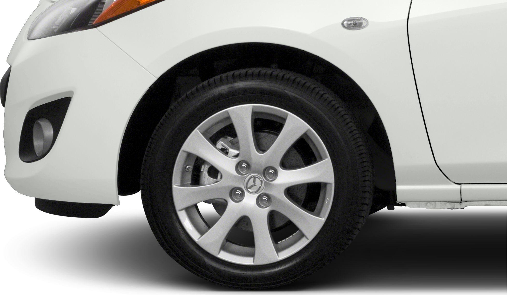 Alloy wheel with multi-spoke rim and white front fender detail