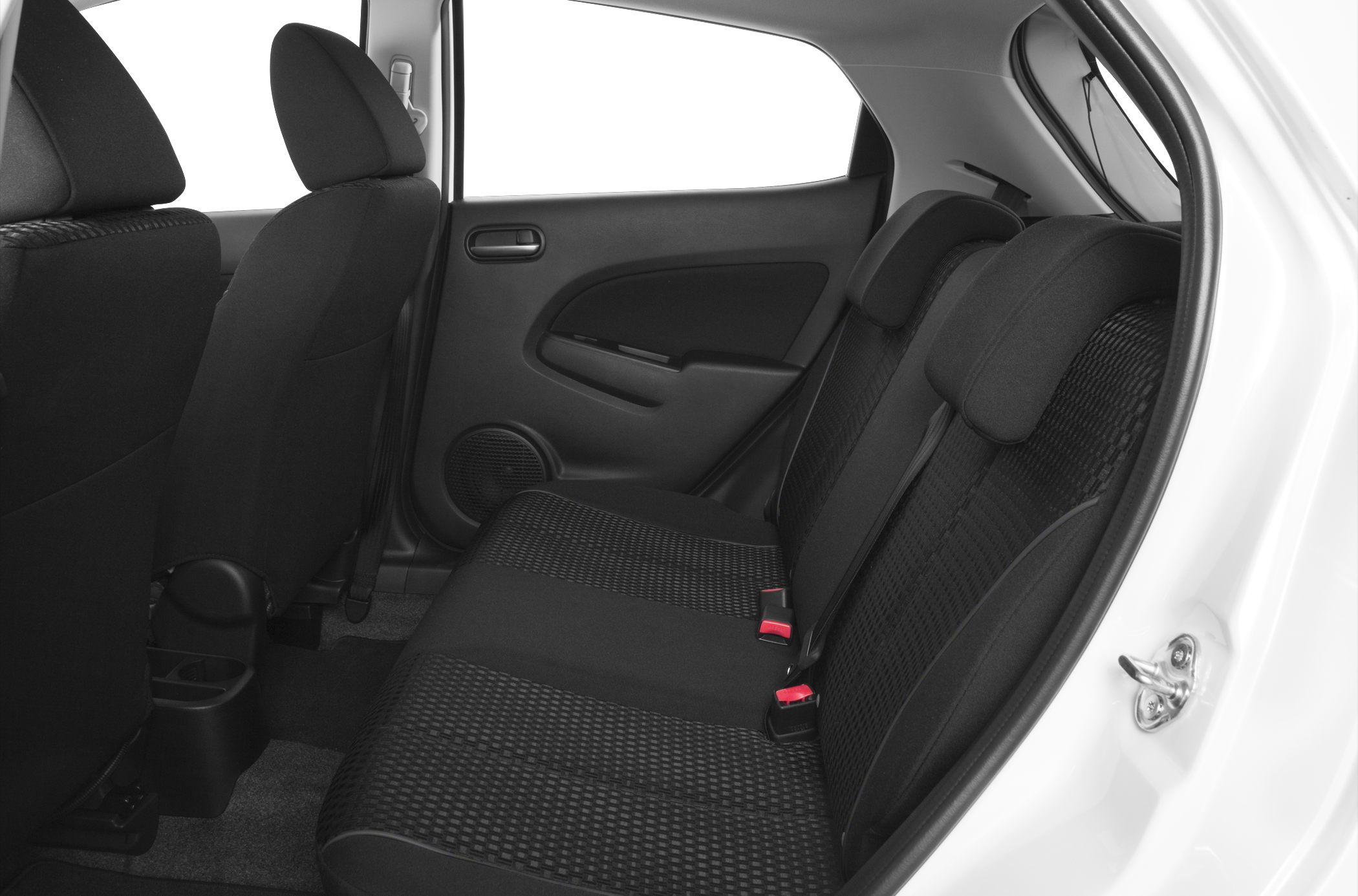 Fabric rear seats and door panel of a compact vehicle's backseat