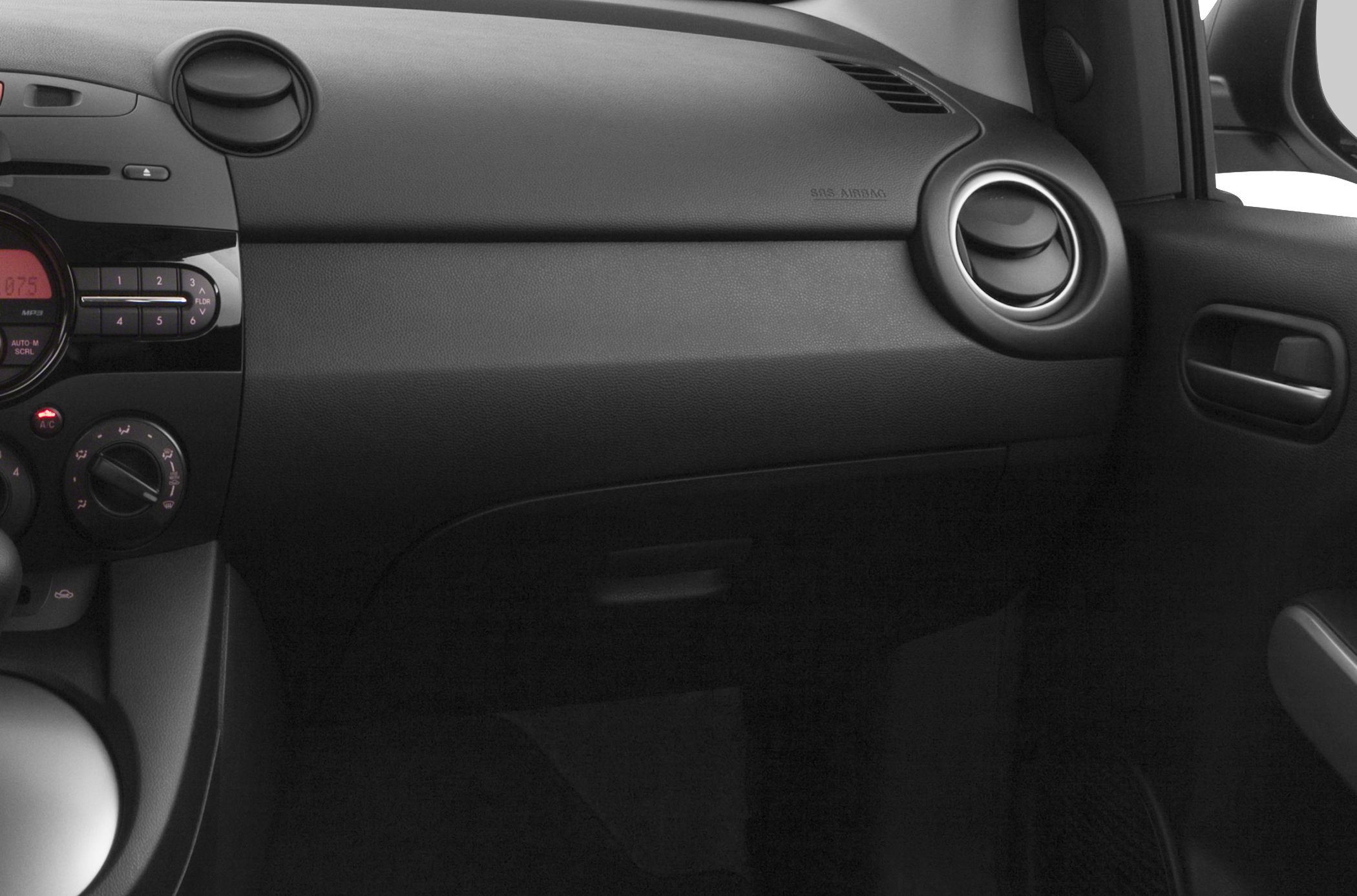 Dashboard and circular air vents with center console controls