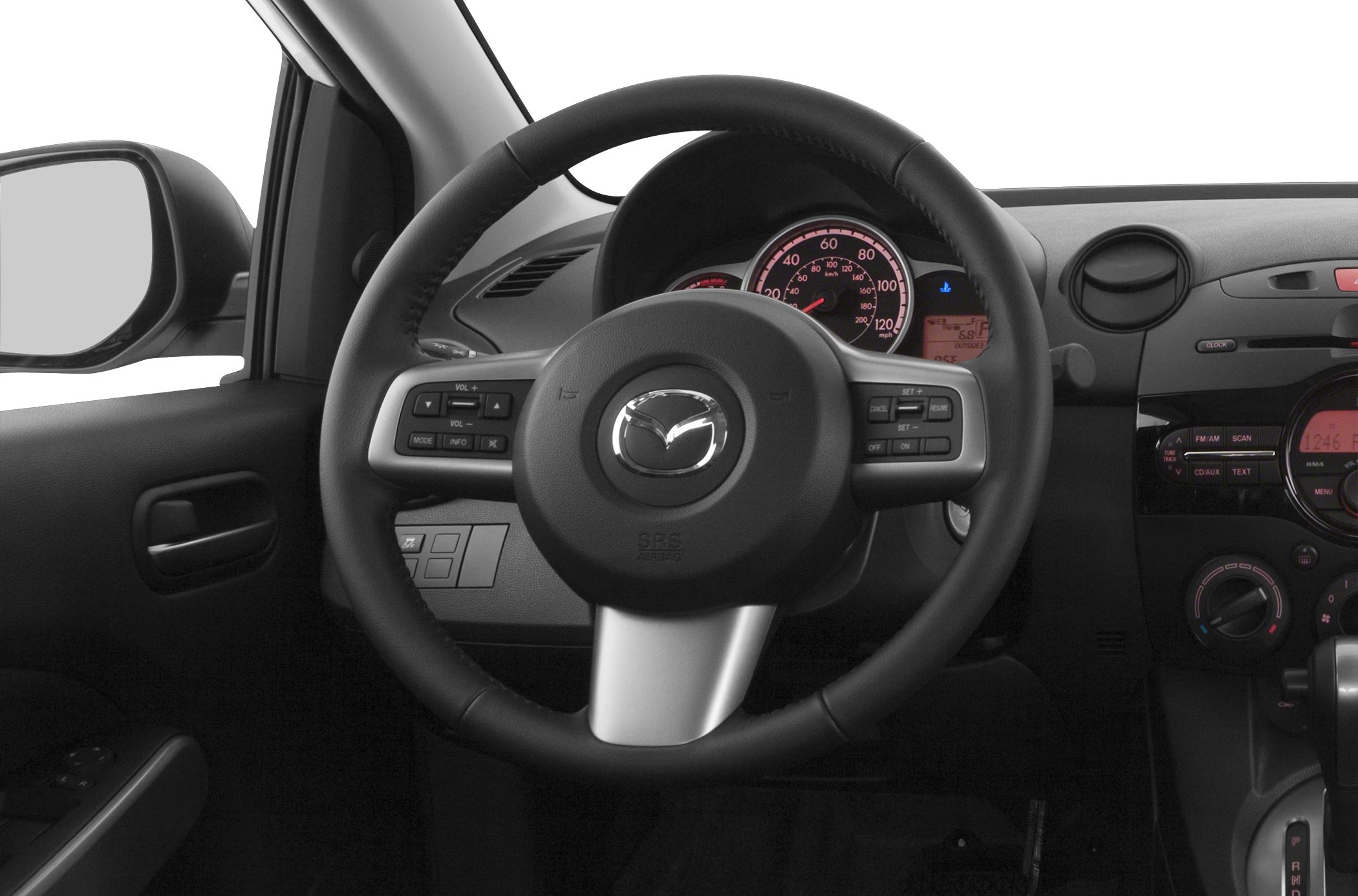 Steering wheel with integrated control buttons and illuminated instrument cluster.