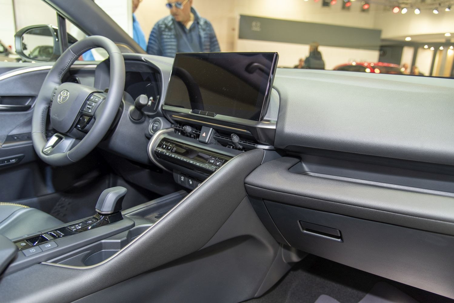 Modern car interior with digital display and sleek dashboard