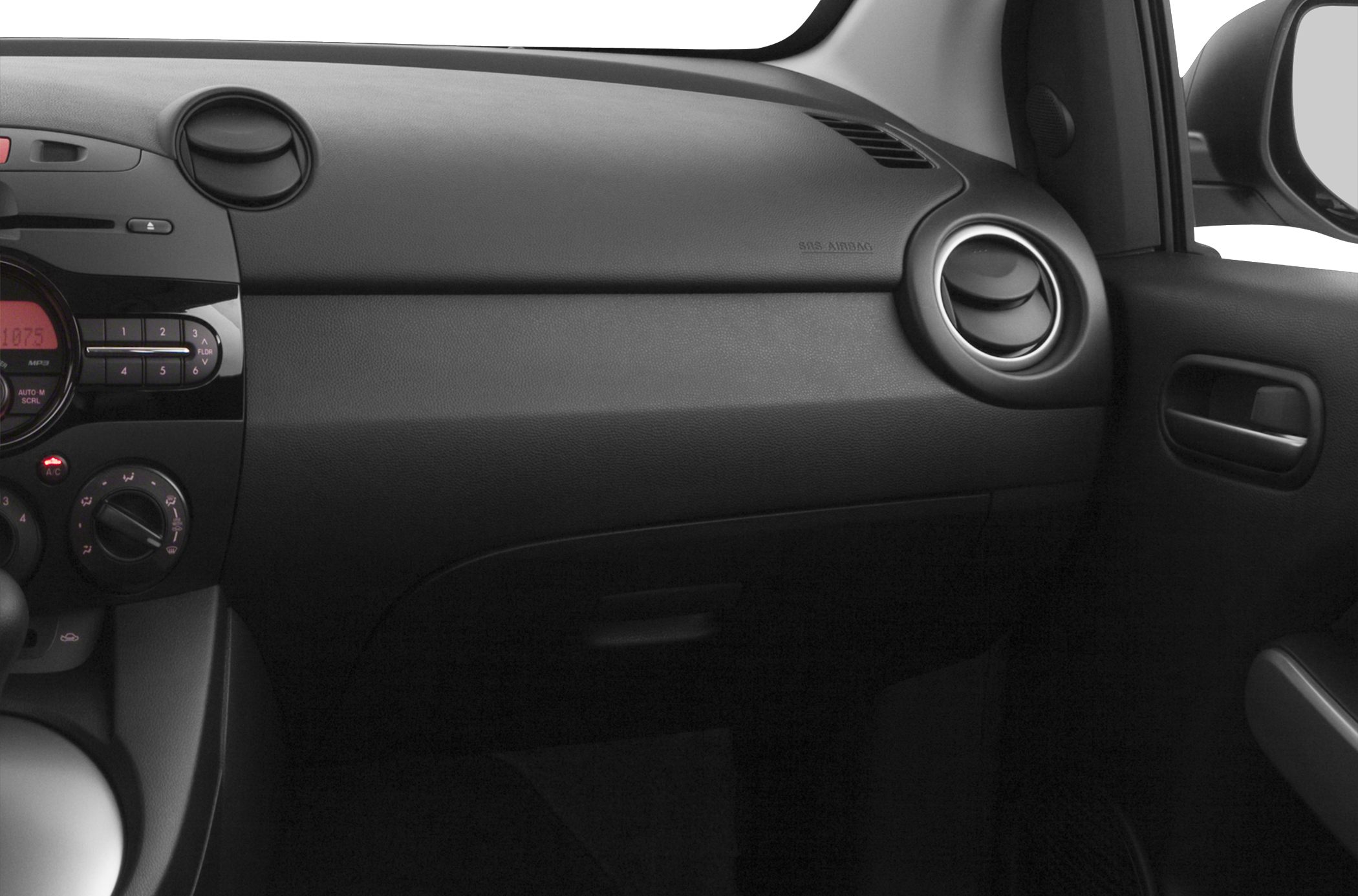 Dashboard and circular air vents with climate controls