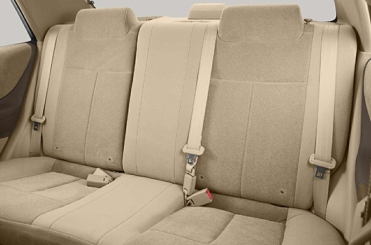 Beige fabric rear seats with three seat belts