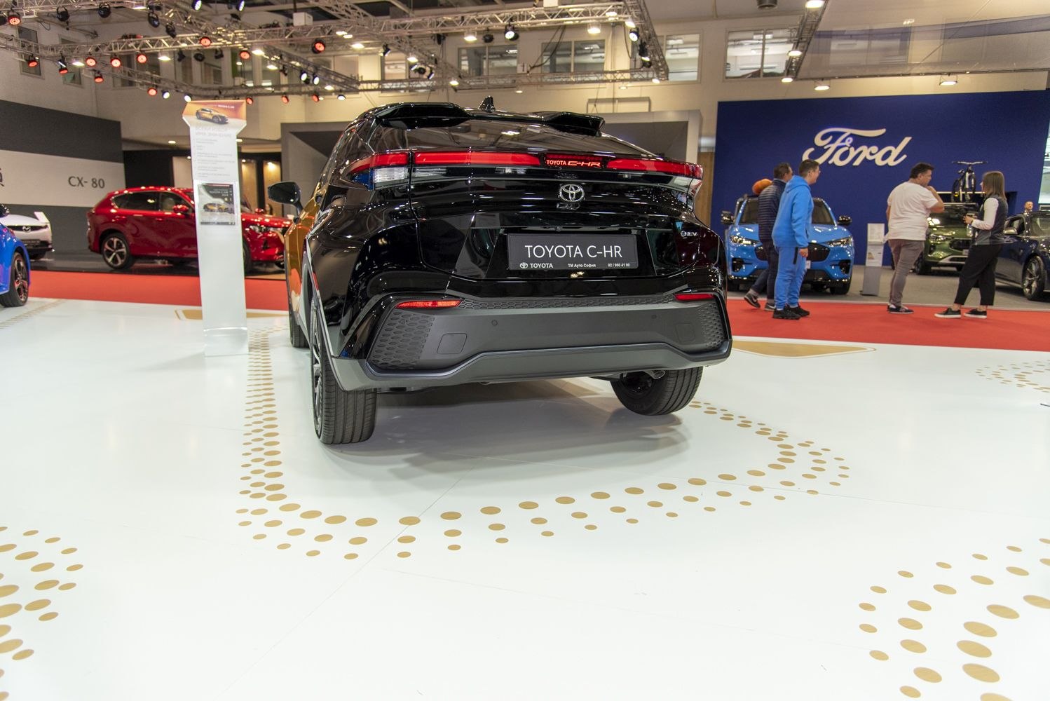 Rear view with distinctive taillights and bumper design