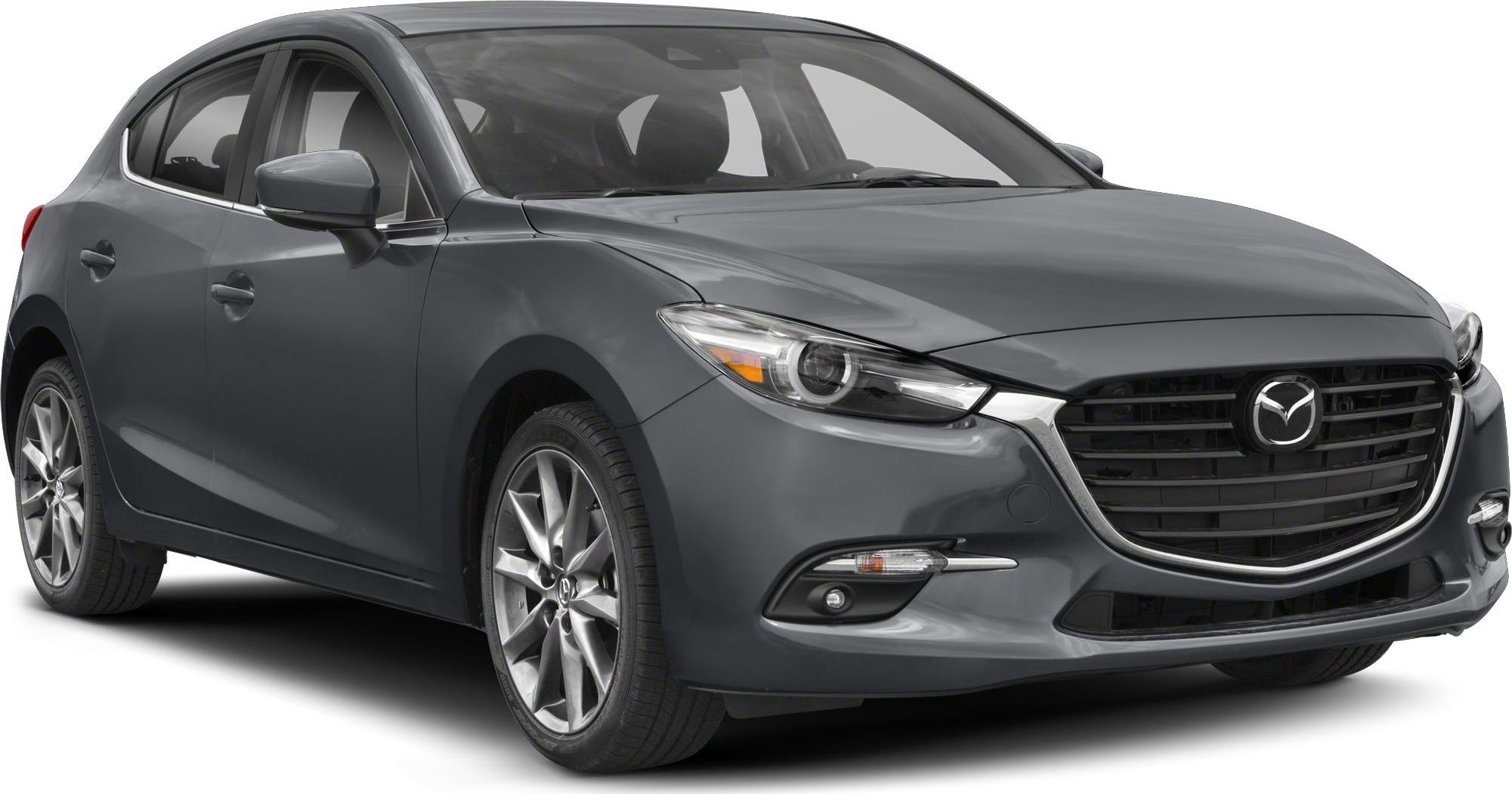 Front angled view of hatchback with LED headlights and alloy wheels