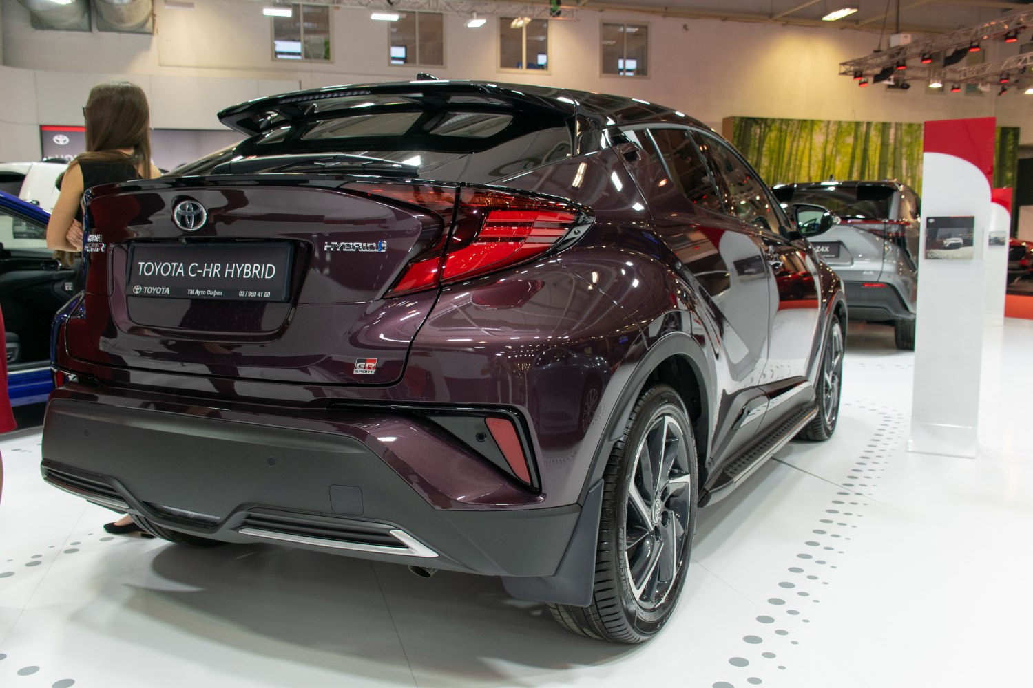 Rear view of a hybrid SUV with sporty taillights and GR Sport trim.