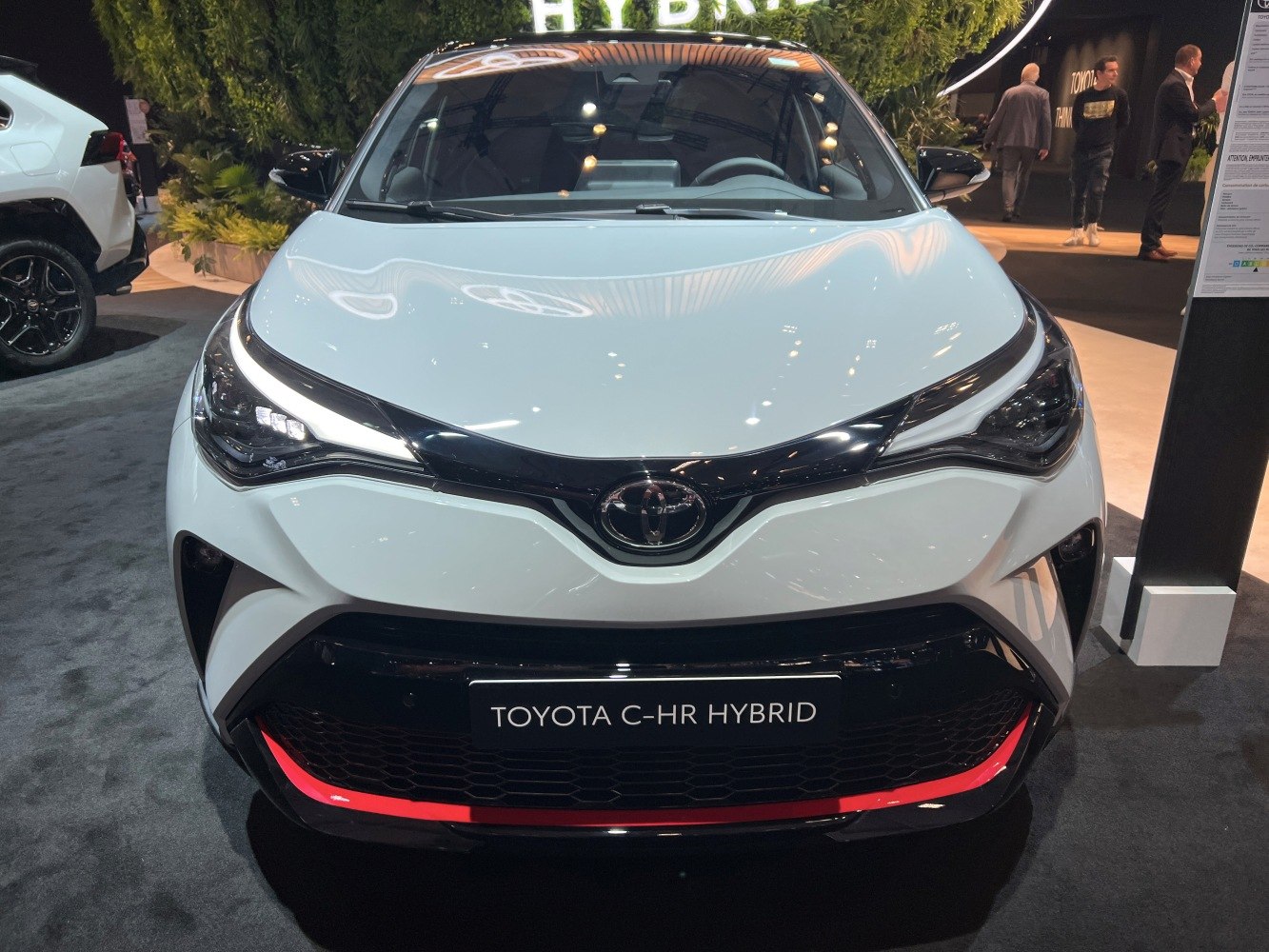 Front view with sharp LED headlights and bold grille design
