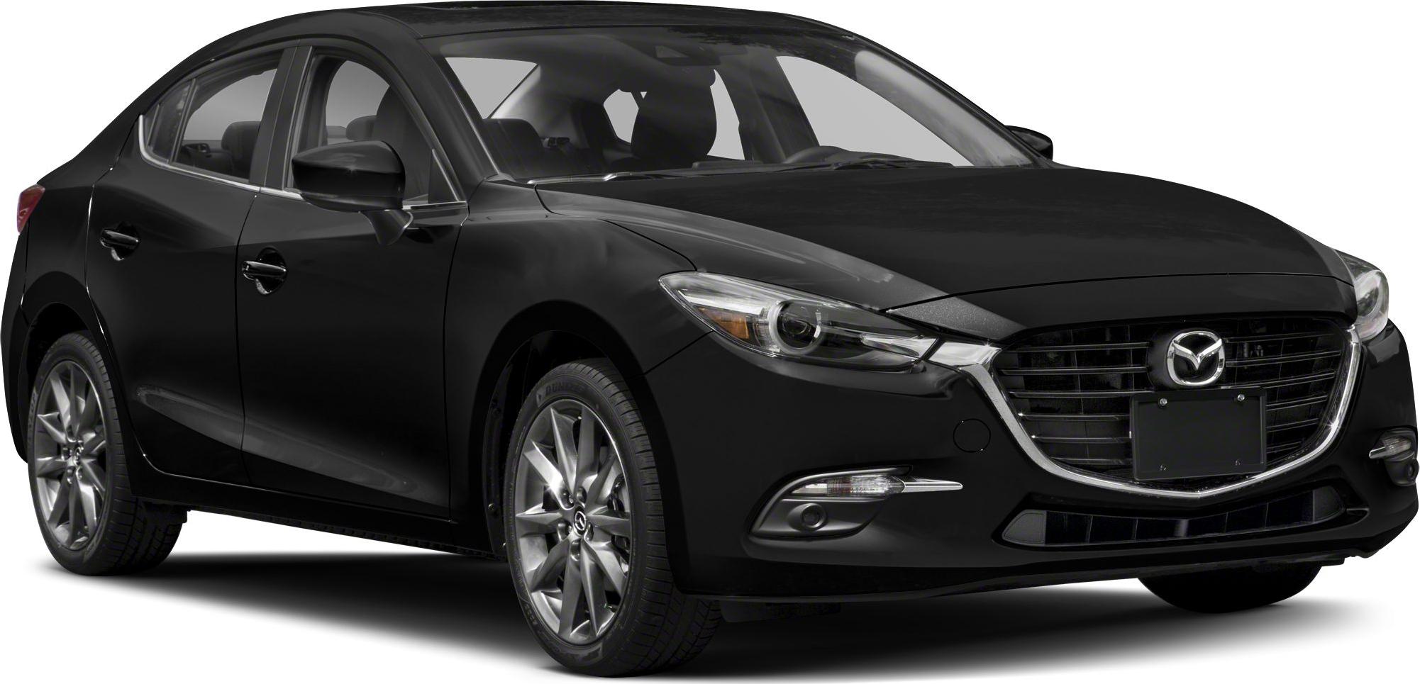 Front grille and sleek headlights with alloy wheels on a sedan