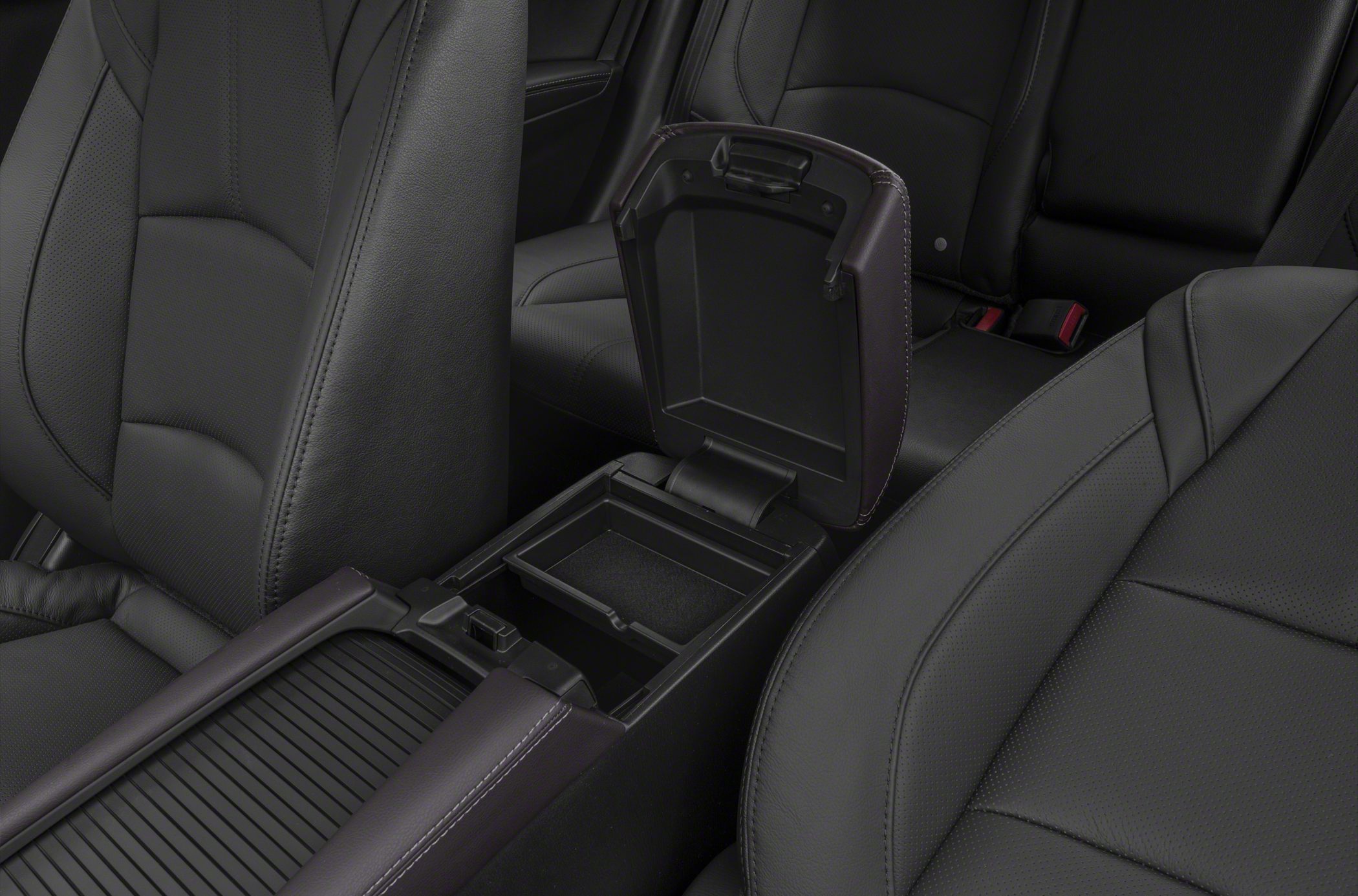 Black leather seats and open center console armrest storage.