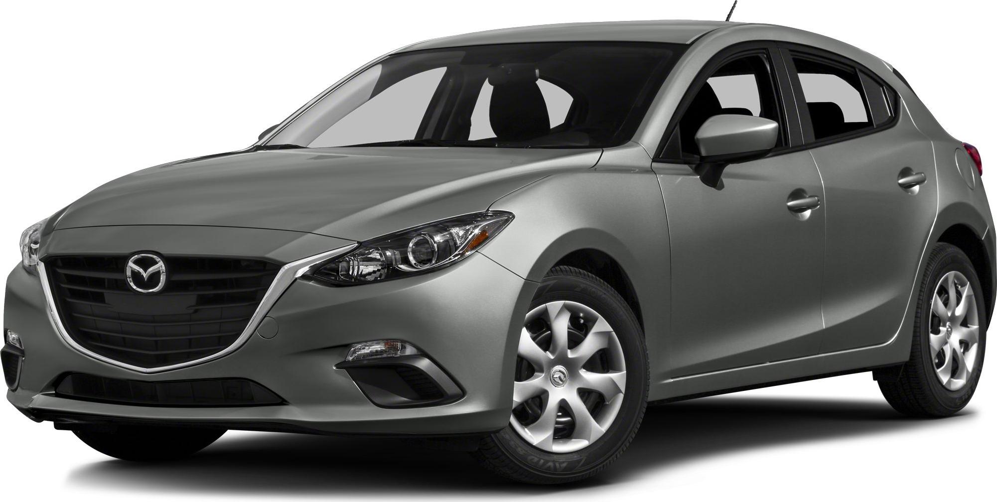 Front and side view of silver hatchback with distinct grille and headlights