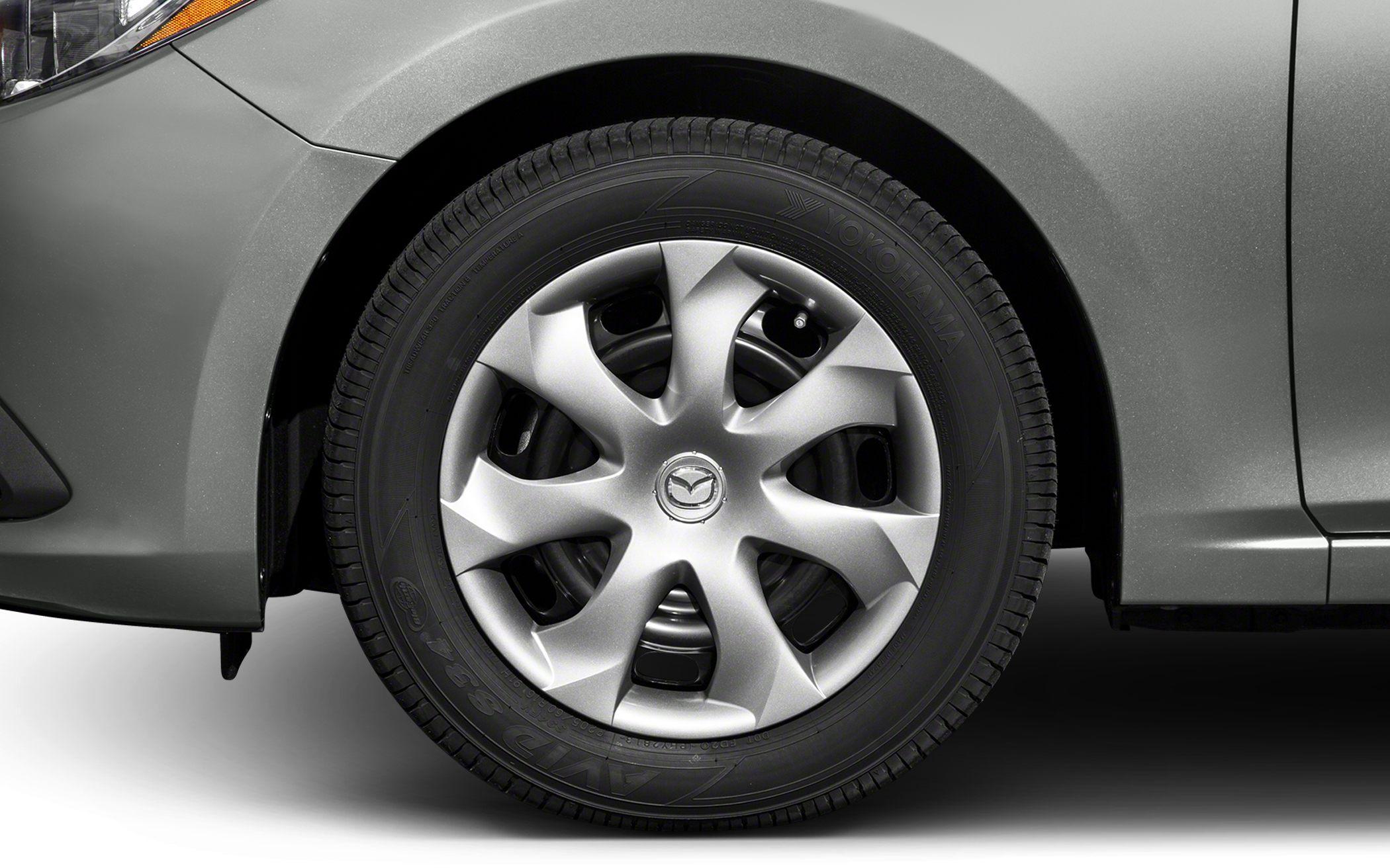 Close-up of alloy wheel and tire on a compact hatchback