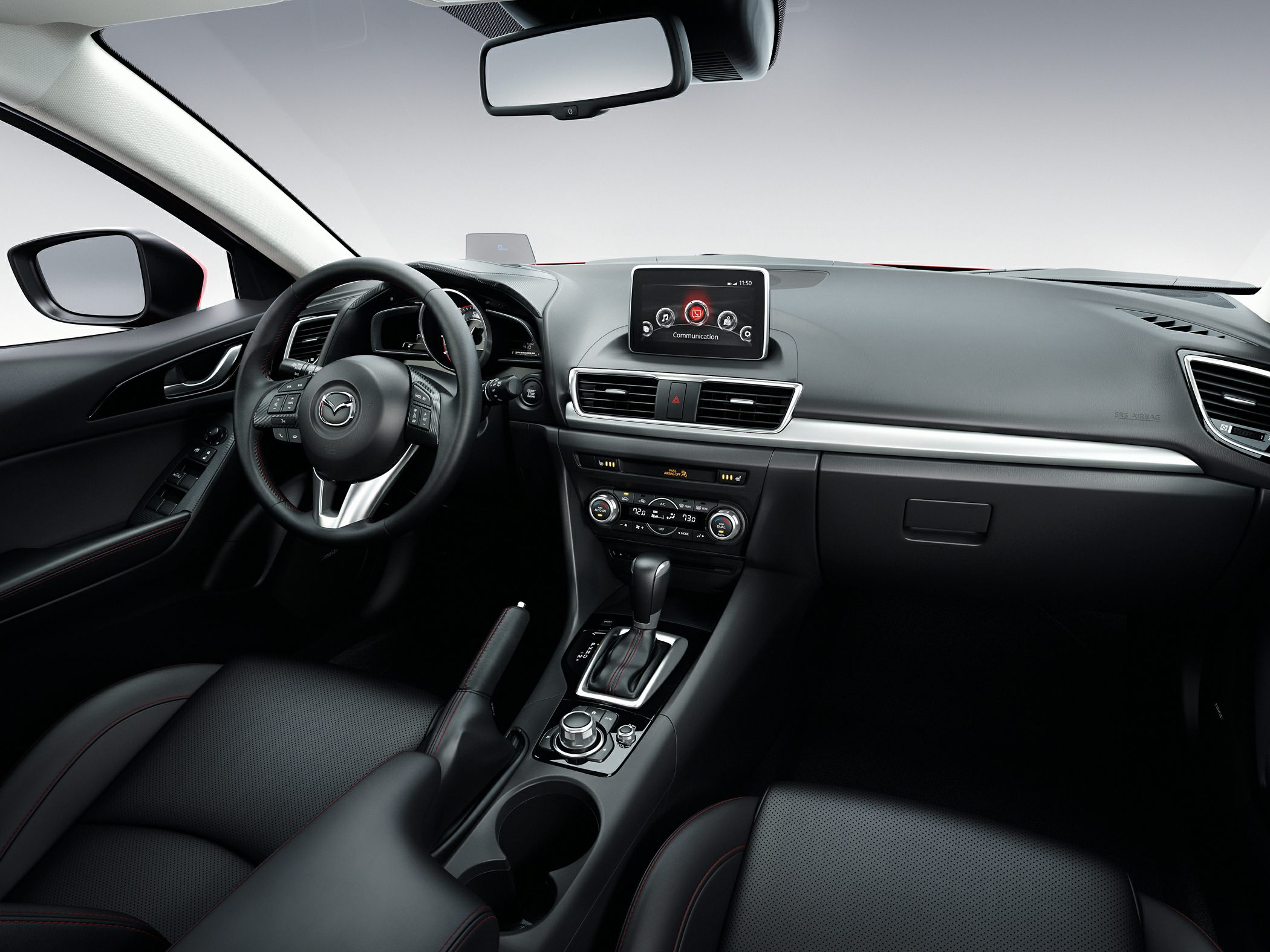 Modern car interior featuring dashboard, steering wheel, and infotainment screen