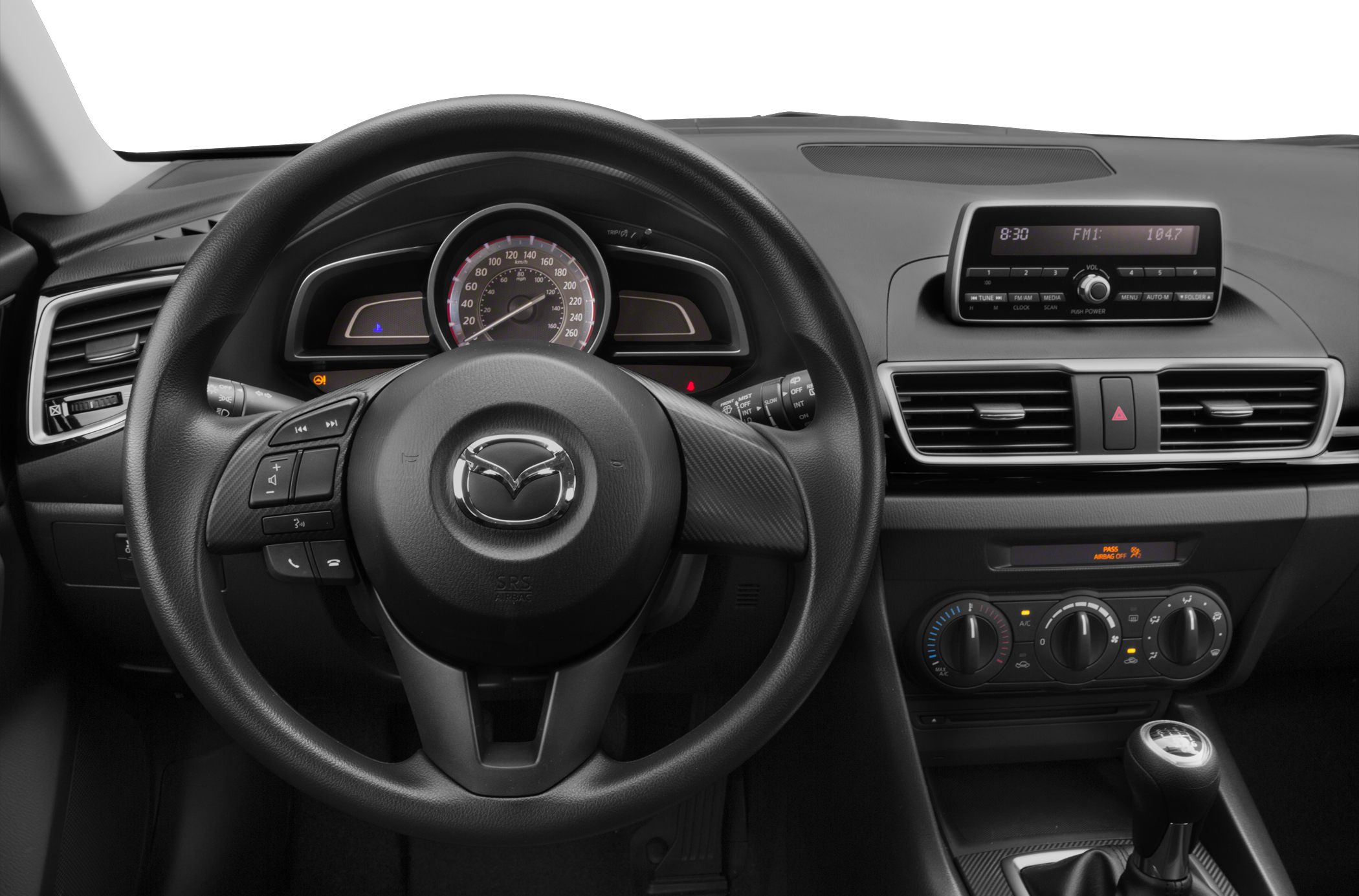 Steering wheel and dashboard with instrument cluster and infotainment controls