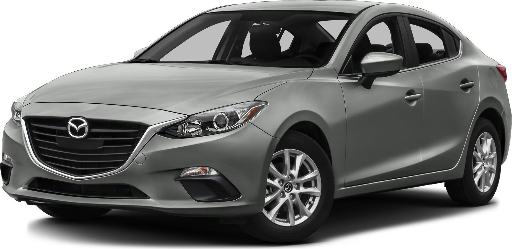 Front three-quarter view of compact sedan with distinctive grille and headlights
