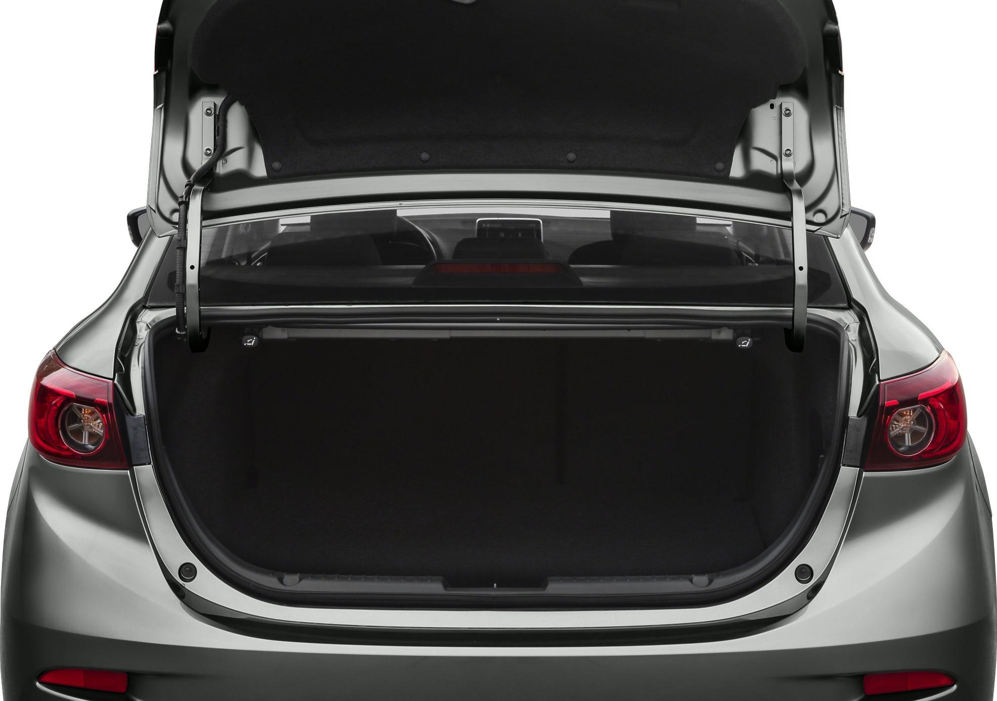 Open trunk space with rear taillights and trunk lid