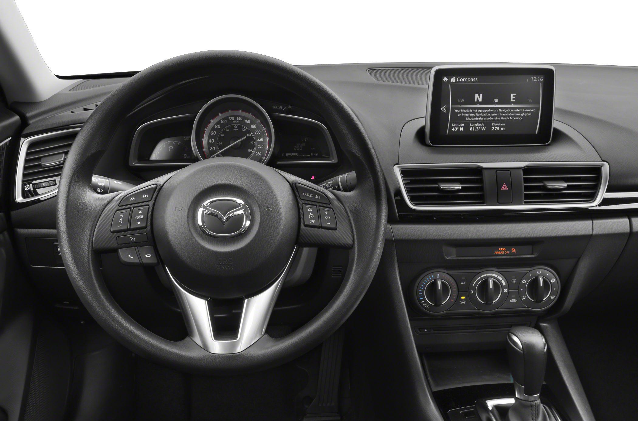 Dashboard, steering wheel, infotainment display, and climate controls