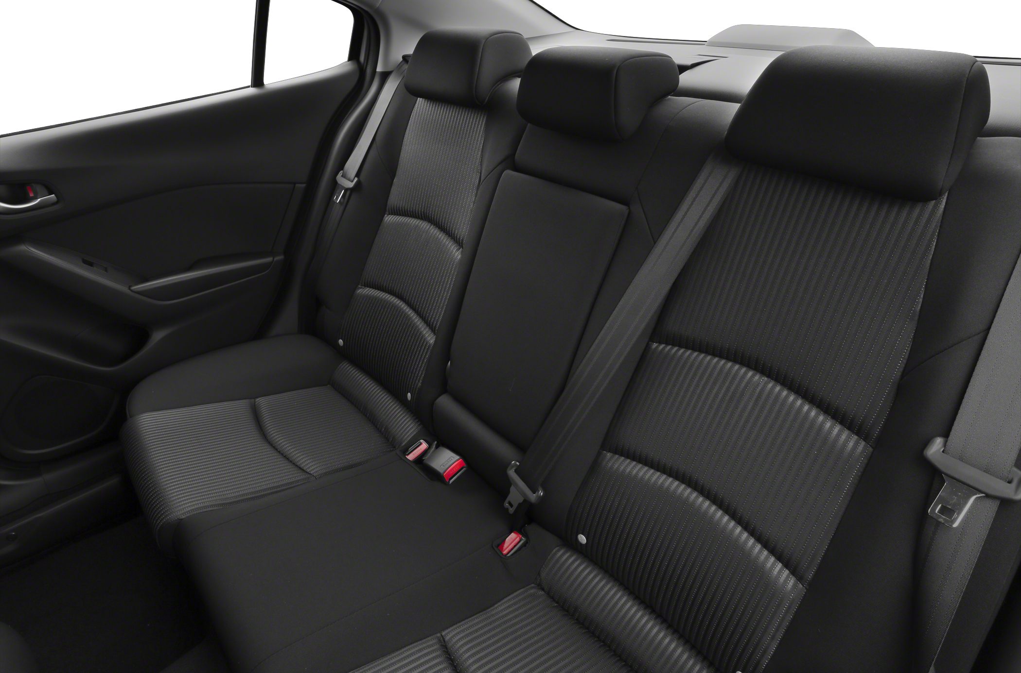 Rear seat with black fabric upholstery, three headrests, and seatbelts.