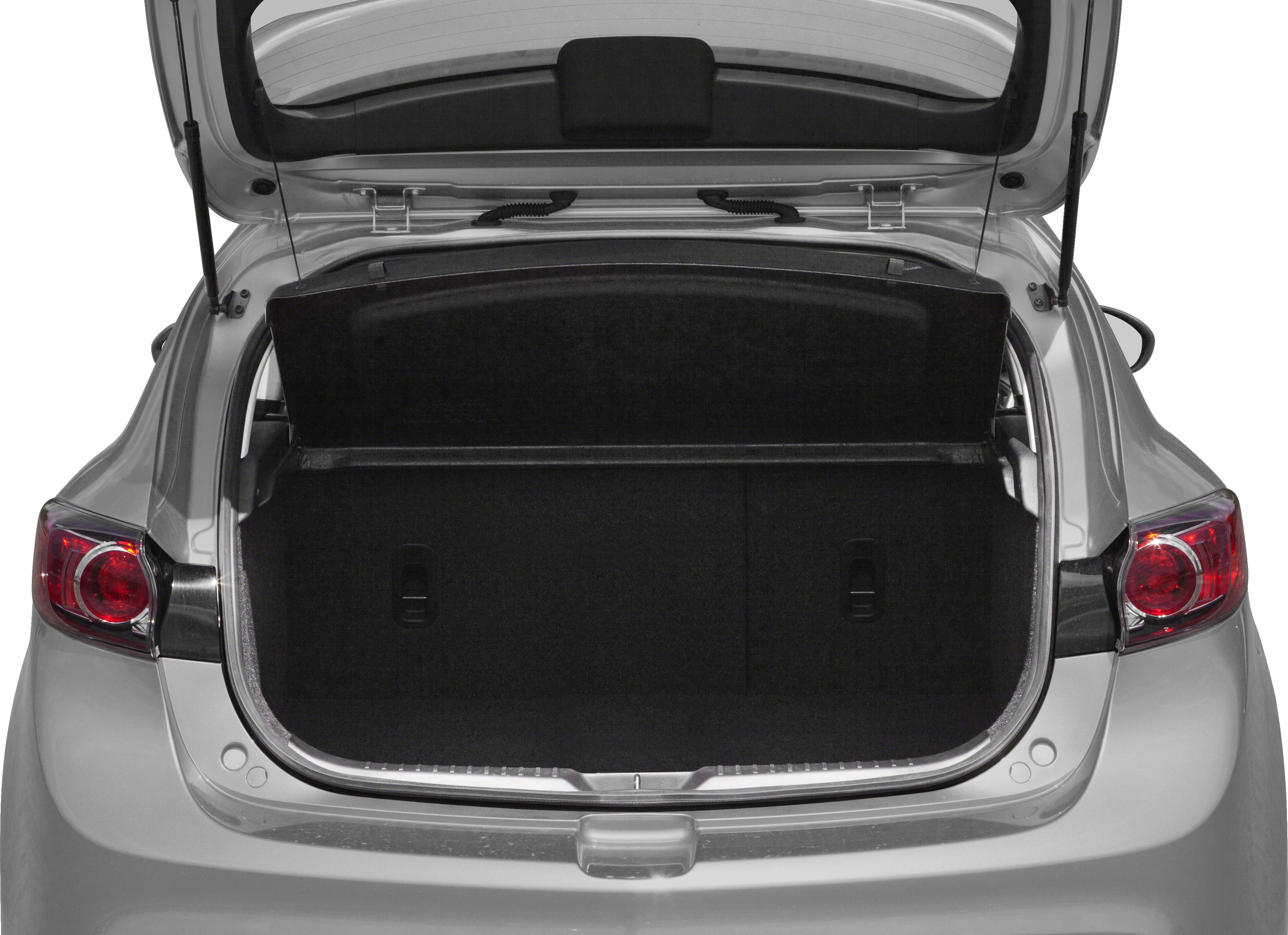 Open trunk space and rear hatch of a hatchback car.