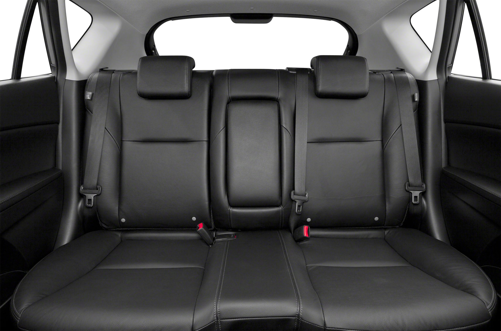 Plush black leather rear seats with headrests and seat belts