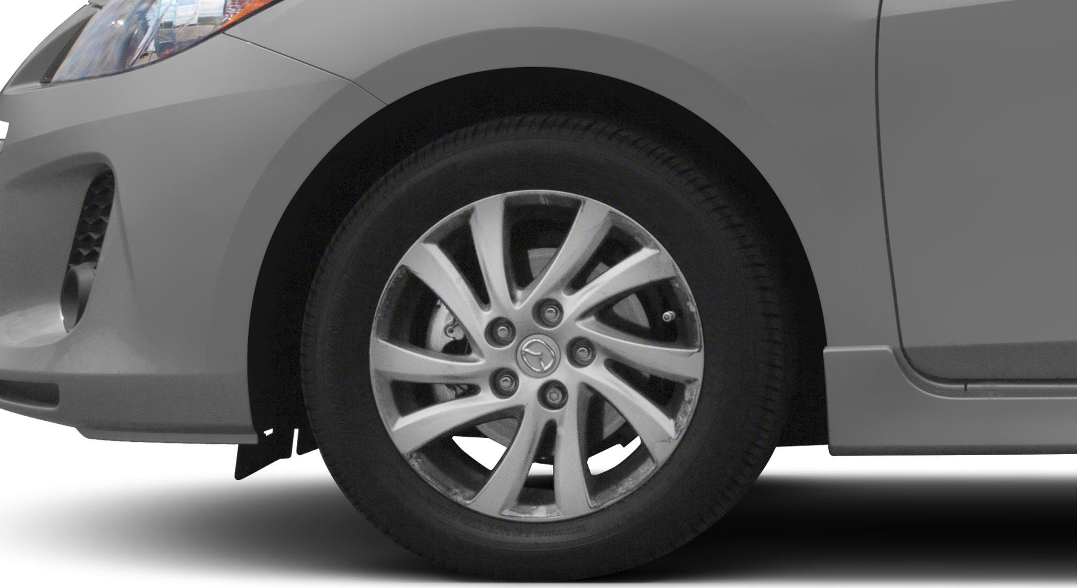 Multi-spoke alloy wheel and front fender detail
