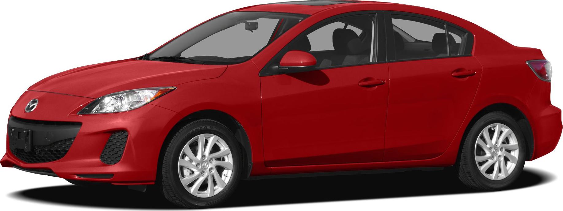 Side view of a red sedan with striking front headlights and alloy wheels.