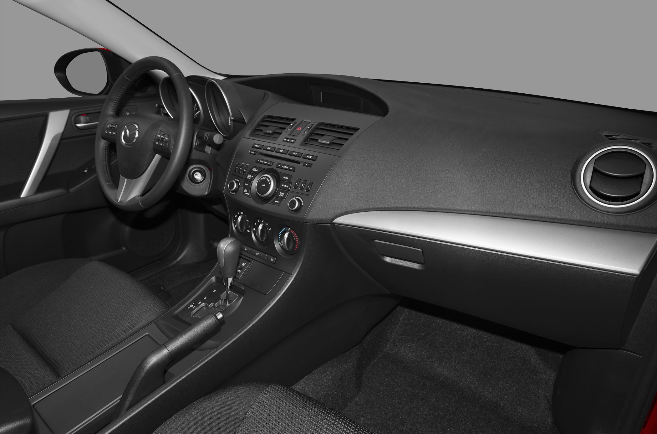 Modern car interior with dashboard, steering wheel, center console