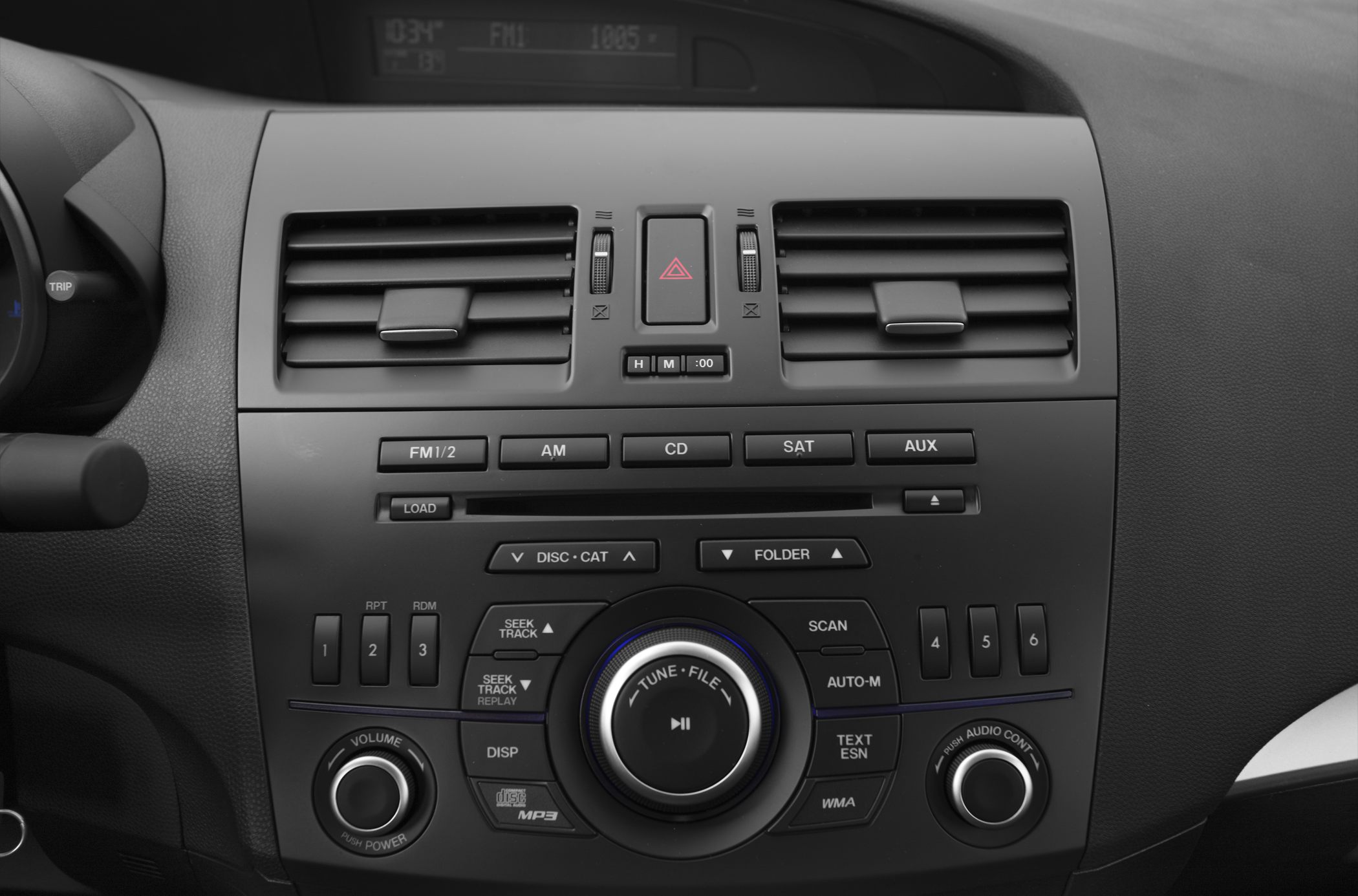 Dashboard audio control panel with air vents and buttons