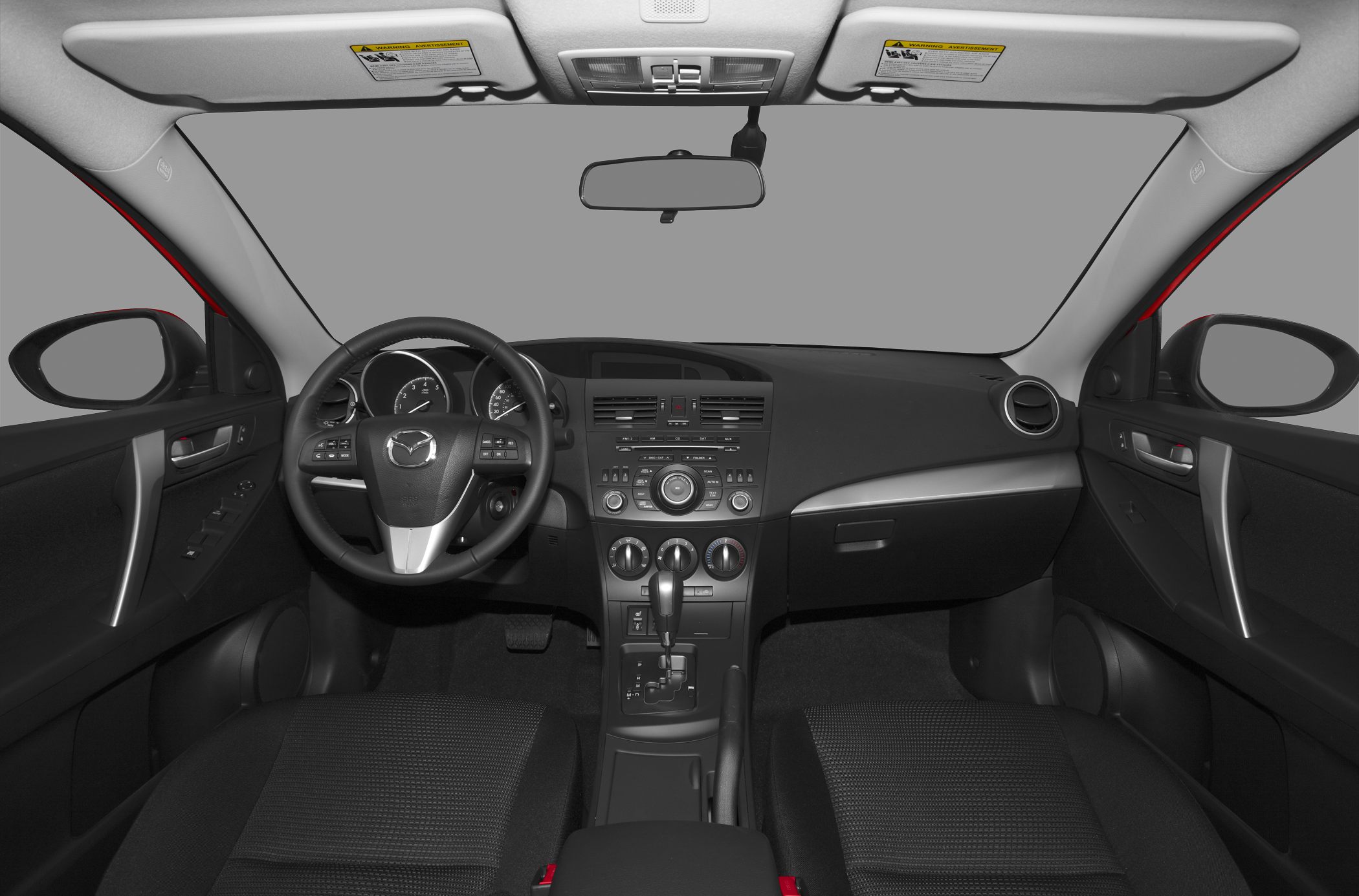 Dashboard view with steering wheel, center console, and front seats