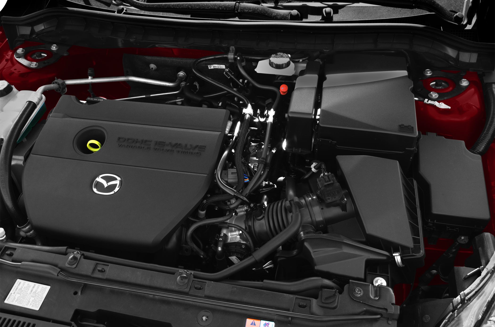 DOHC 16-valve engine cover and air intake system components under hood