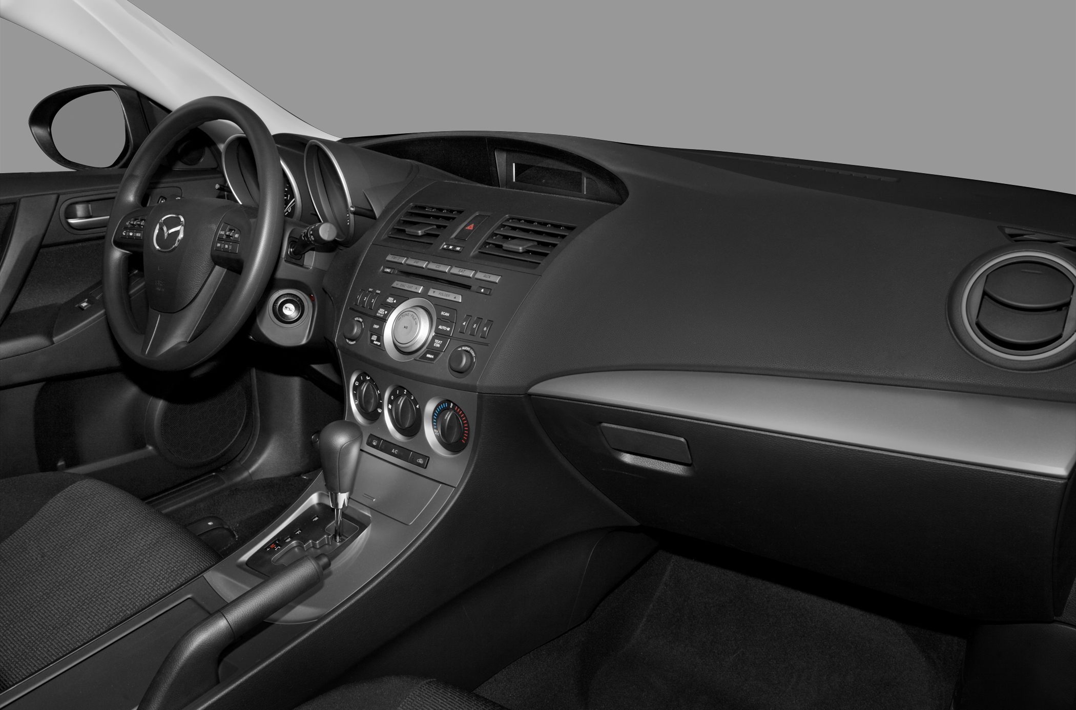 Dashboard, steering wheel, center console with climate and audio controls