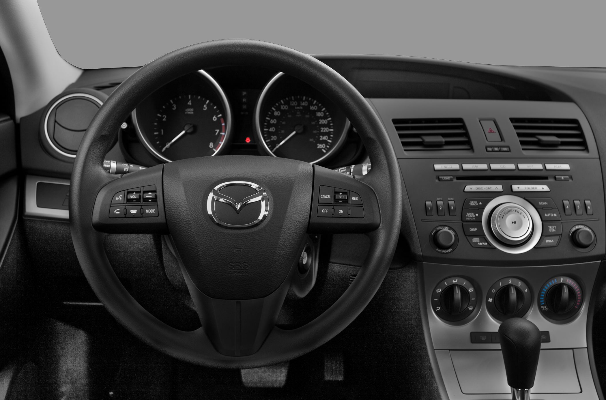 Steering wheel, instrument cluster, and center console with controls