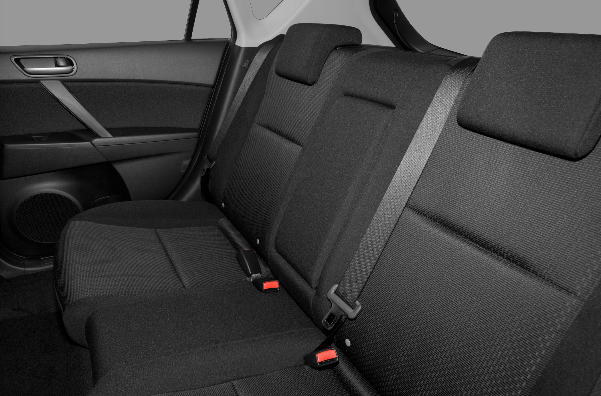 Black fabric rear seats with seatbelts and door panel