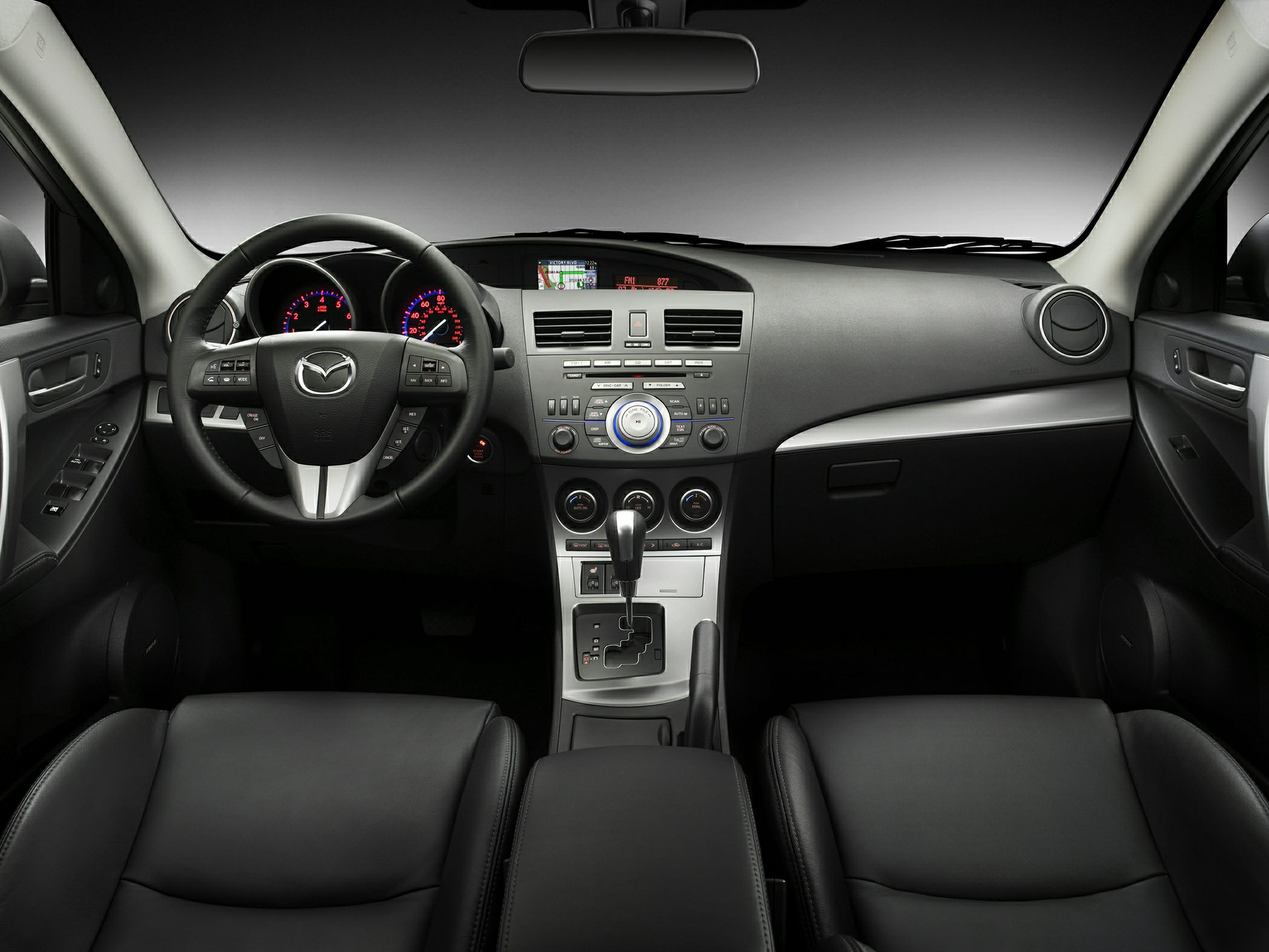 Dashboard and leather seats with steering wheel and center console