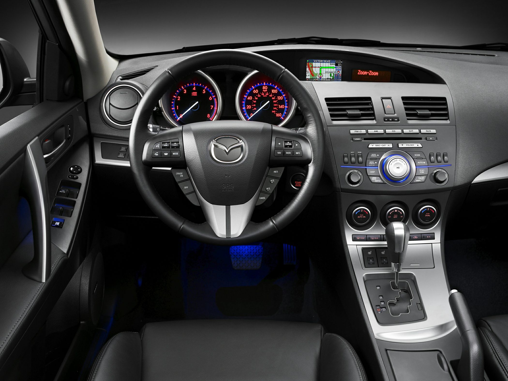 Interior dashboard, steering wheel, center console with gear shift