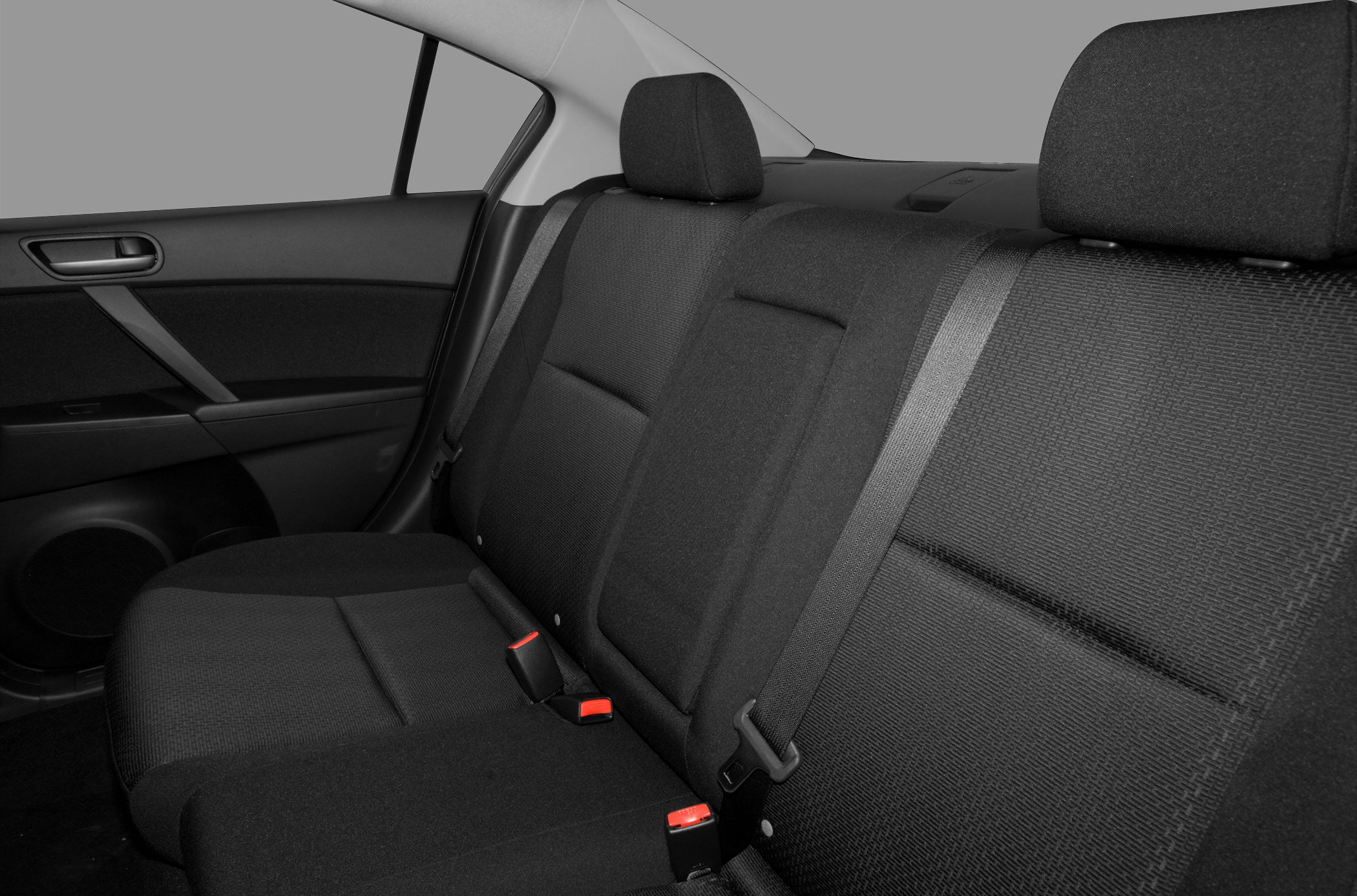 Black fabric rear seats with seat belts and door panel