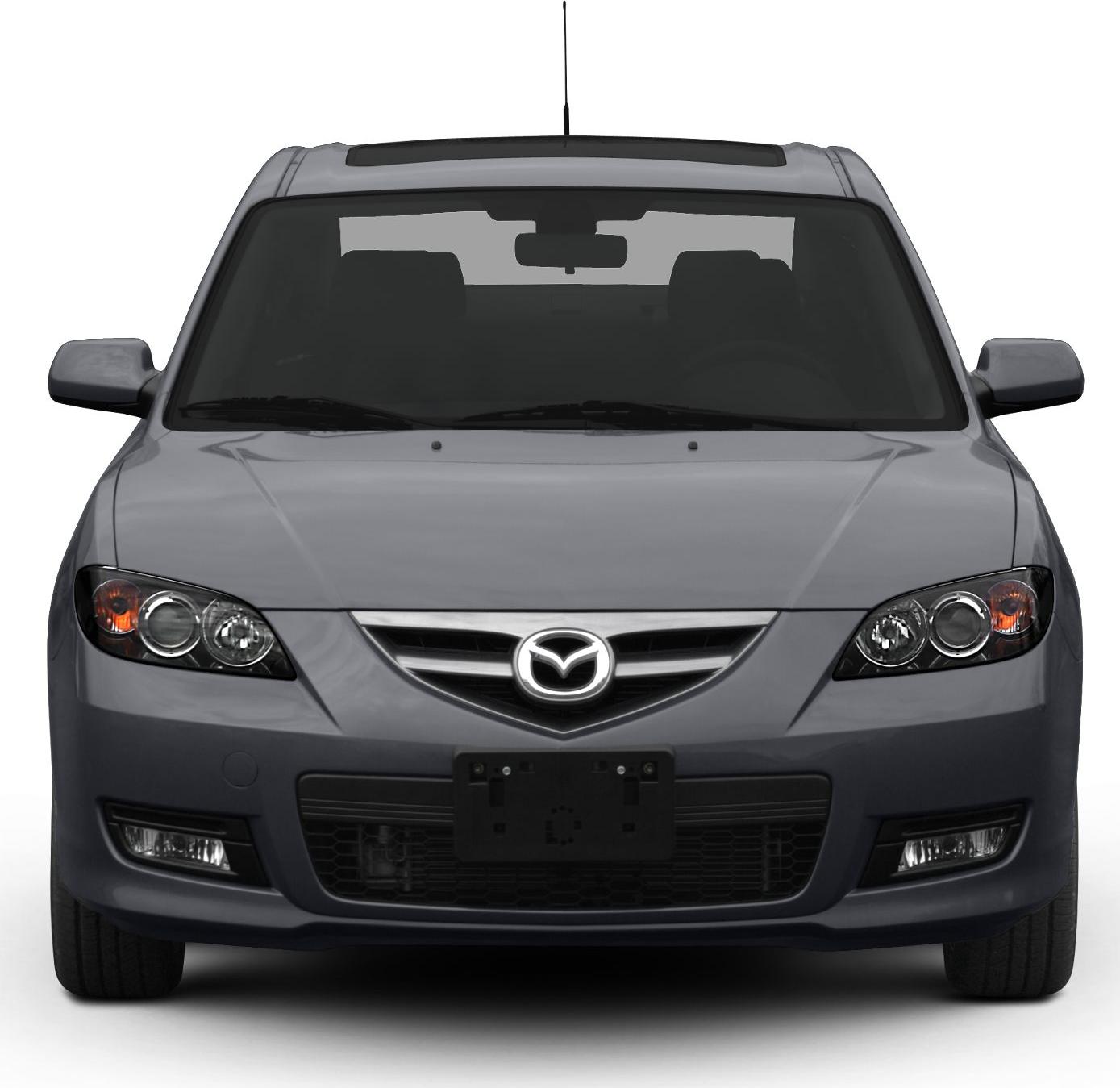 Front view with headlights, grille, and bumper of a sedan