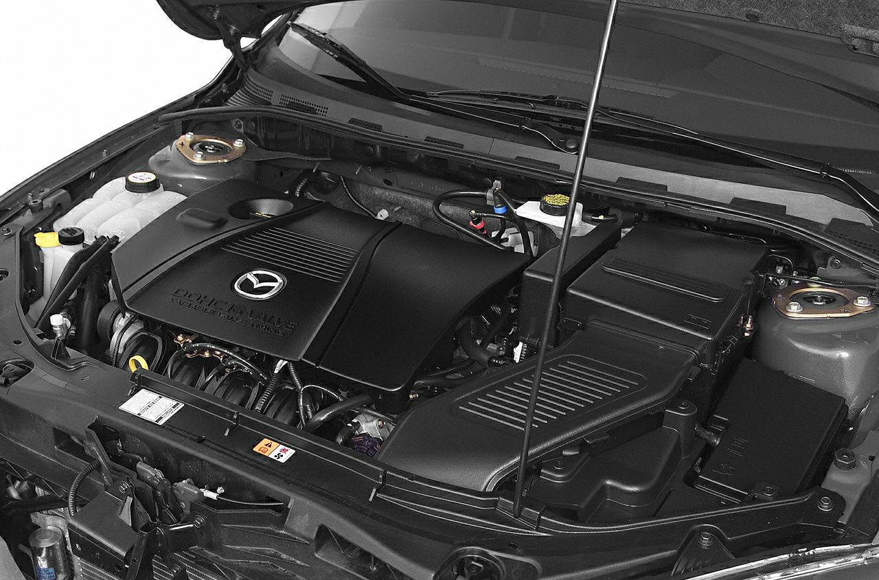 DOHC 16-valve engine compartment with visible components and covers