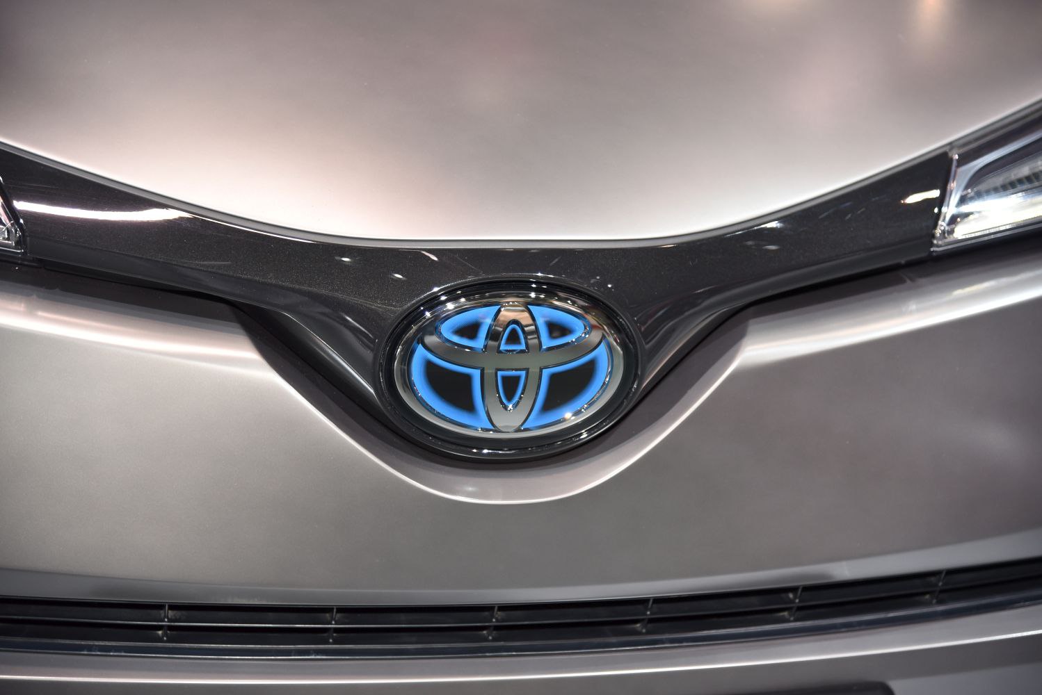 Close-up of Toyota front emblem and grille design